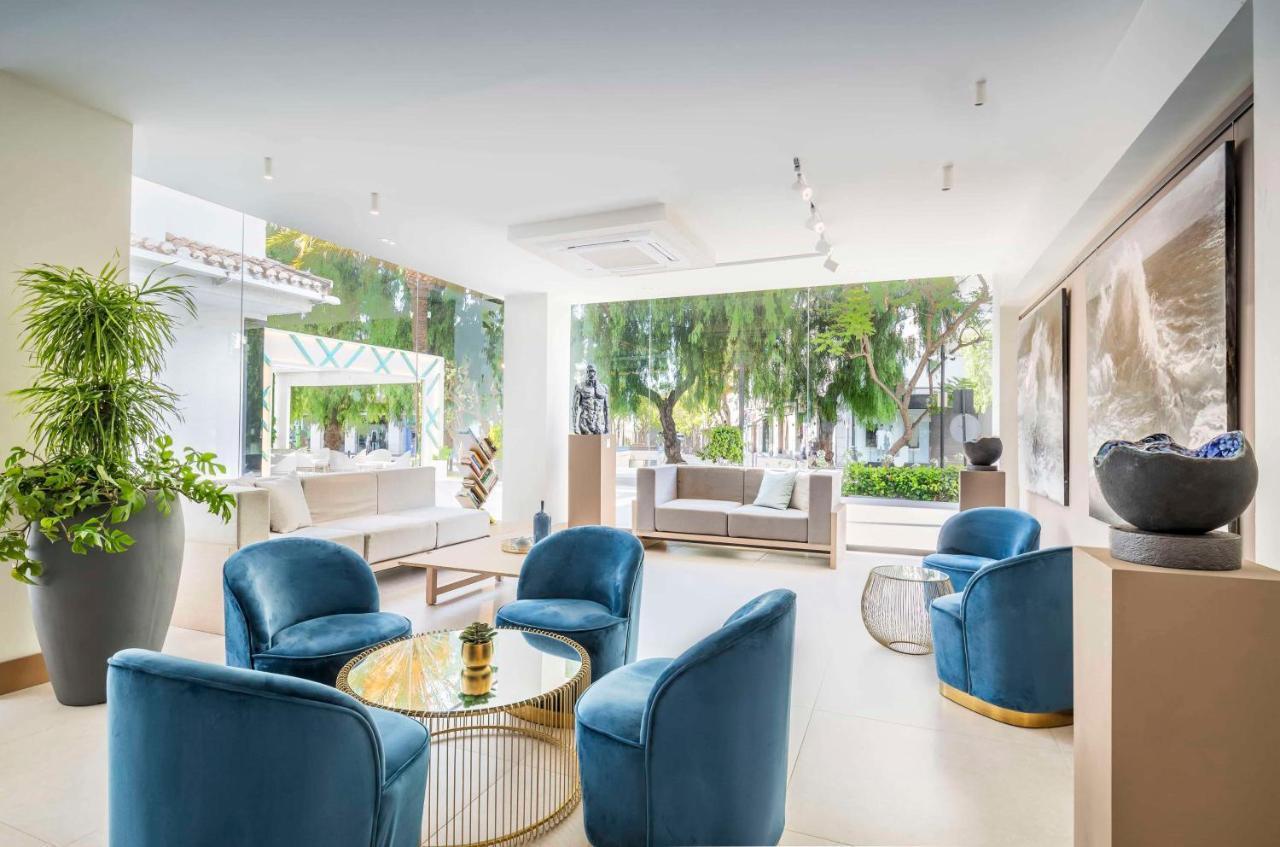 Lounging area in the reception of Hotel PYR Marbella