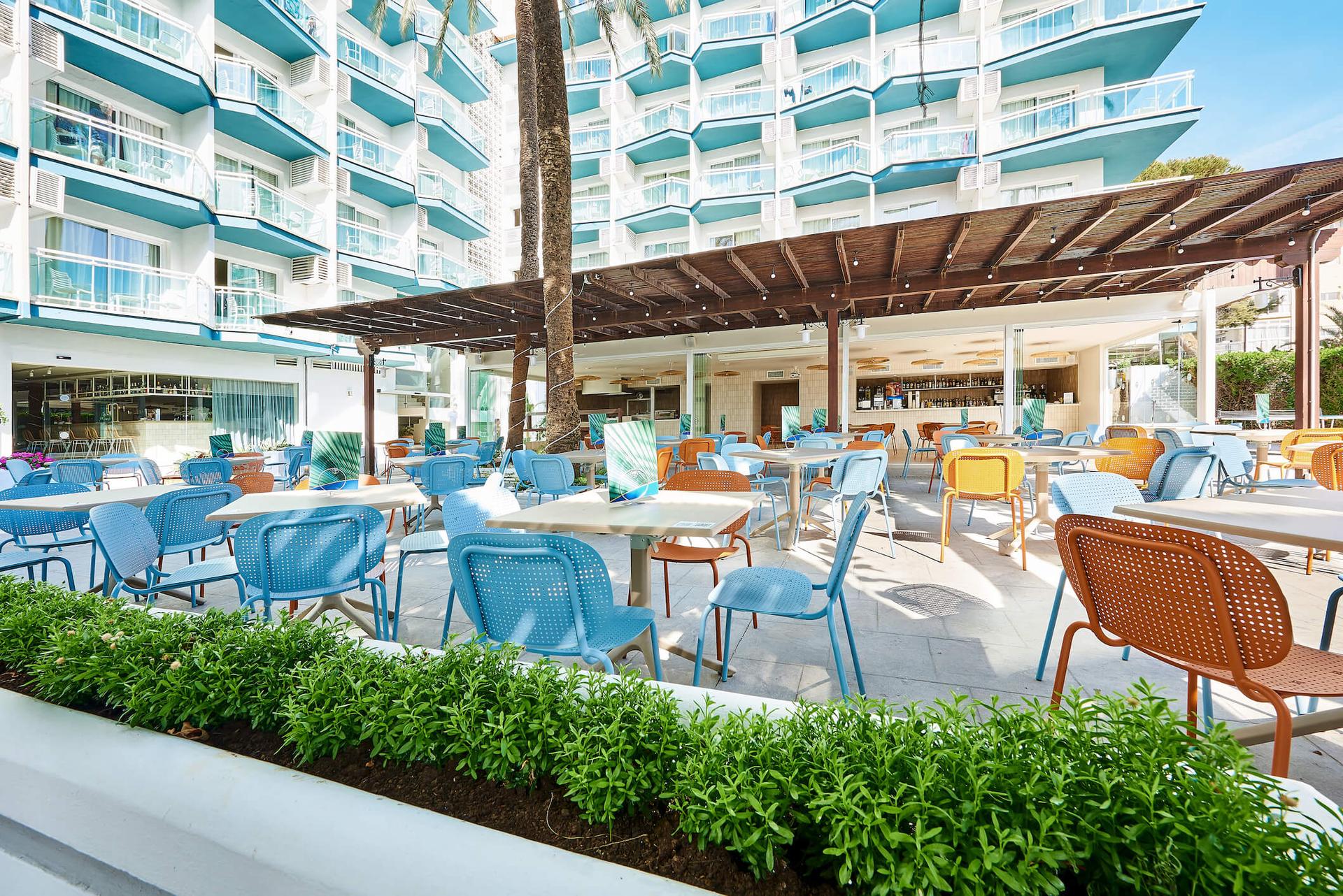Outdoor lounging area at Hotel Palmasol