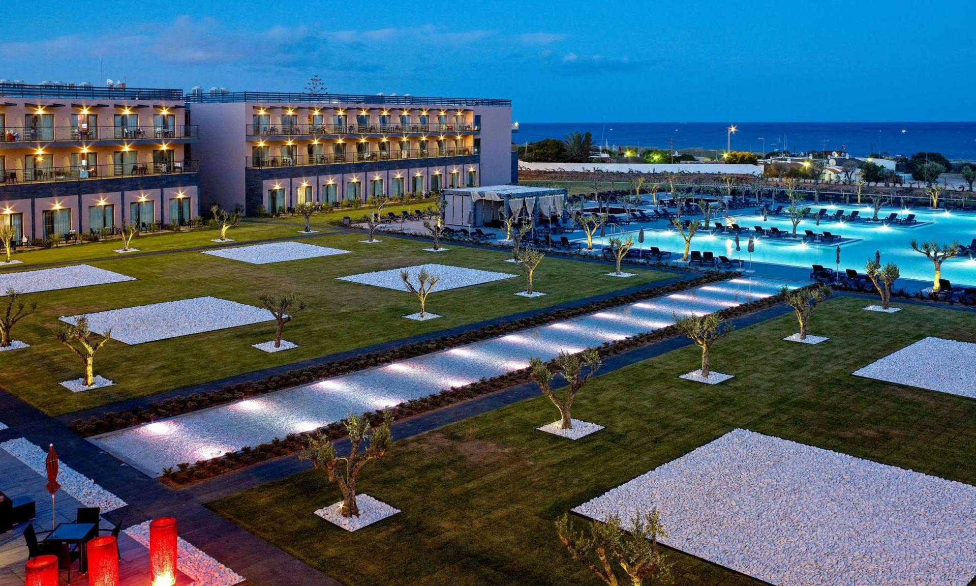 Overhead view of the hotel lit up at evening
