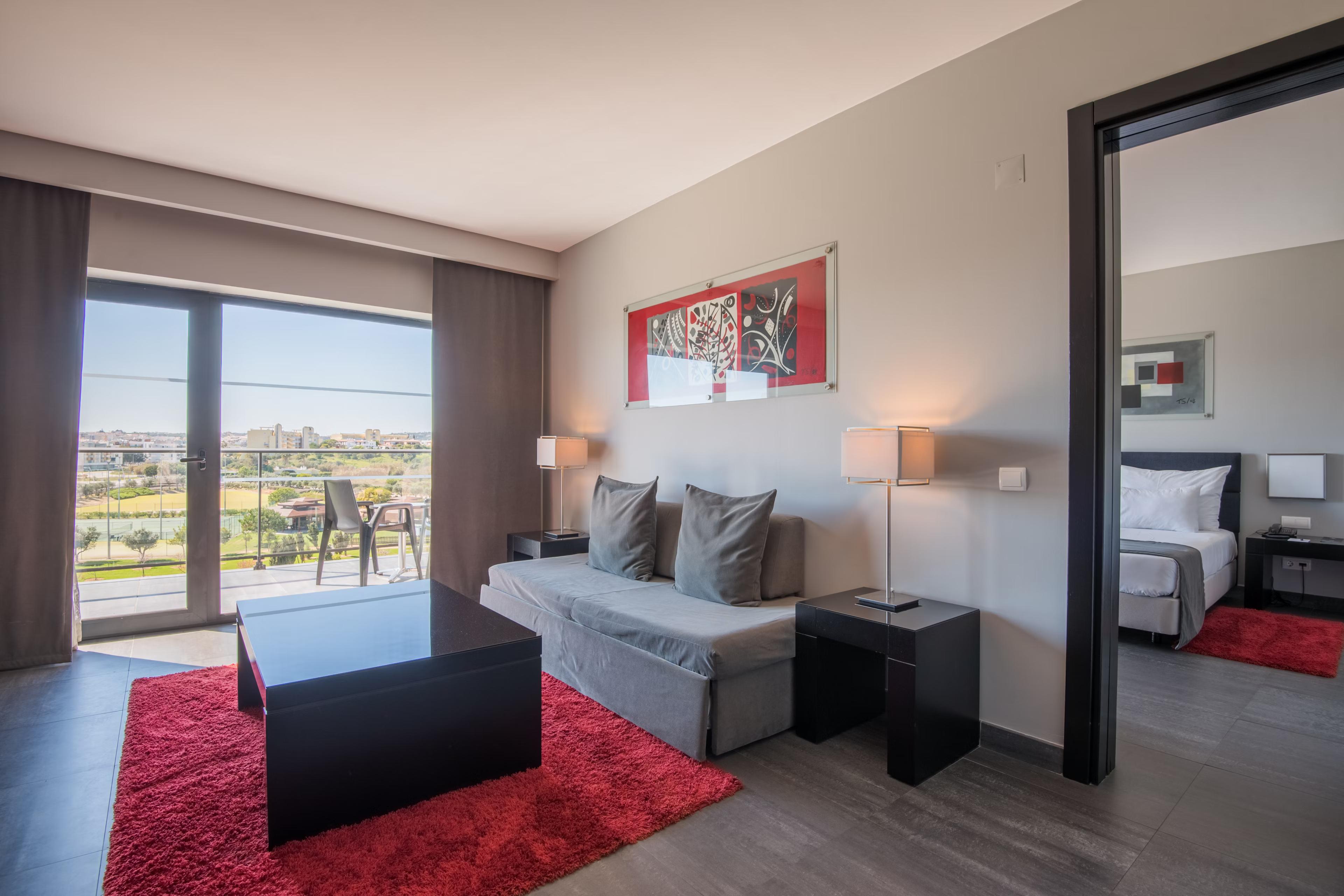 Double bed room at the hotel with balcony views