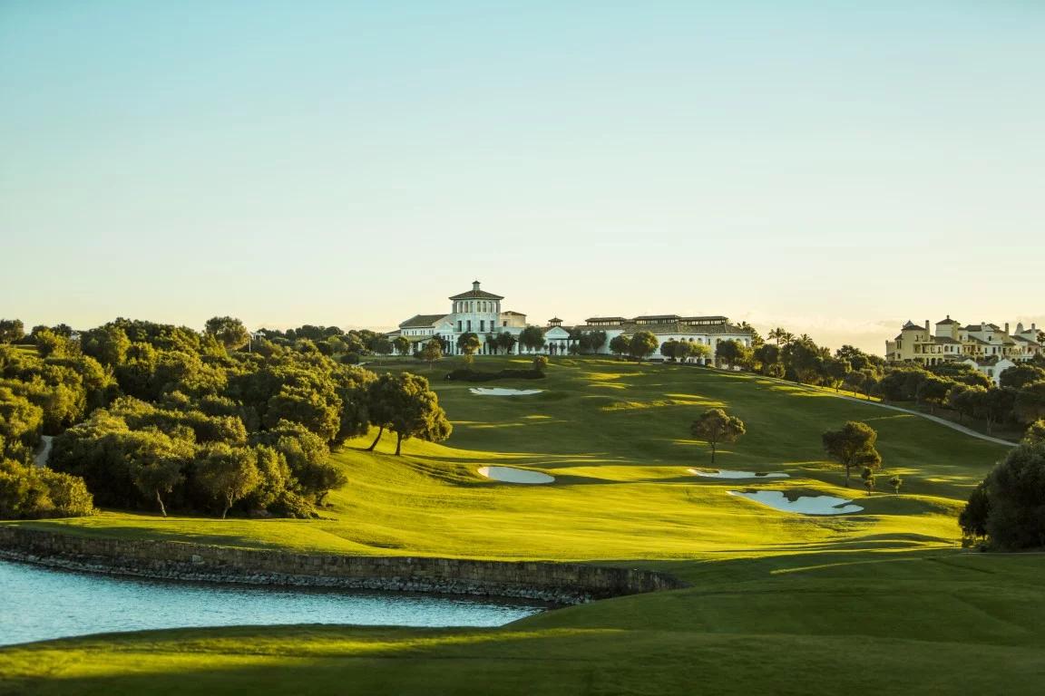 A well maintained downhill fairway nestled with sand bunkers at Kempinski Hotel Bahia