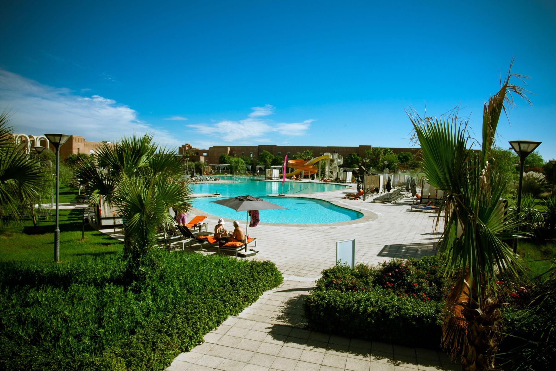 Panoramic view of the outdoor swimming pool at Kenzi Club Agdal Medina