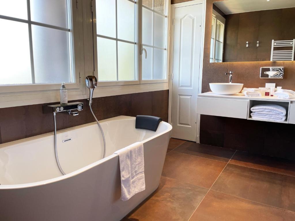 Bathroom as part of a suite at Le Grand Hotel Le Touquet