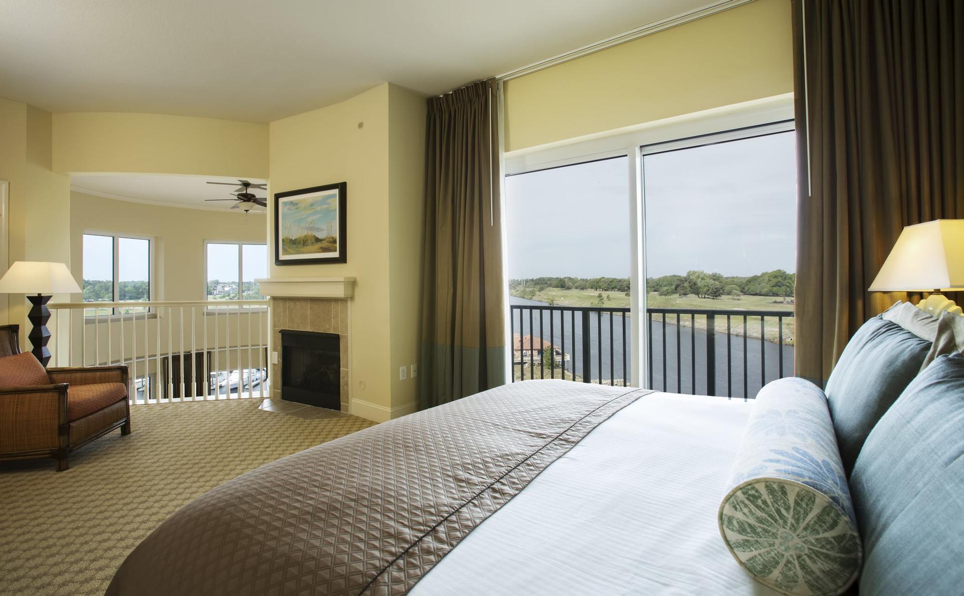 Double bed suite with balcony views at Marina Inn at Grande Dunes