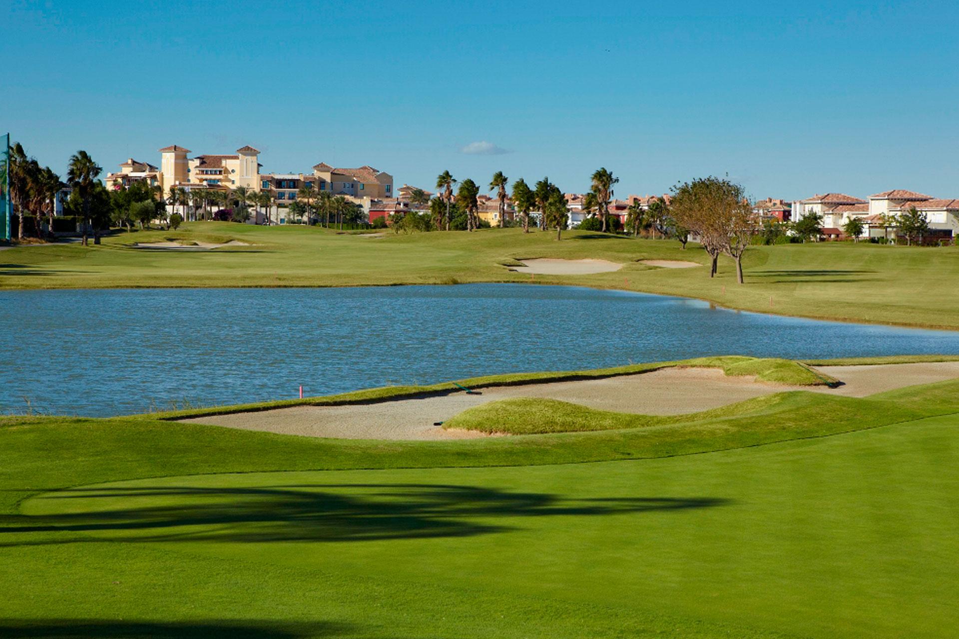 Large water hazard with fairway winding around it