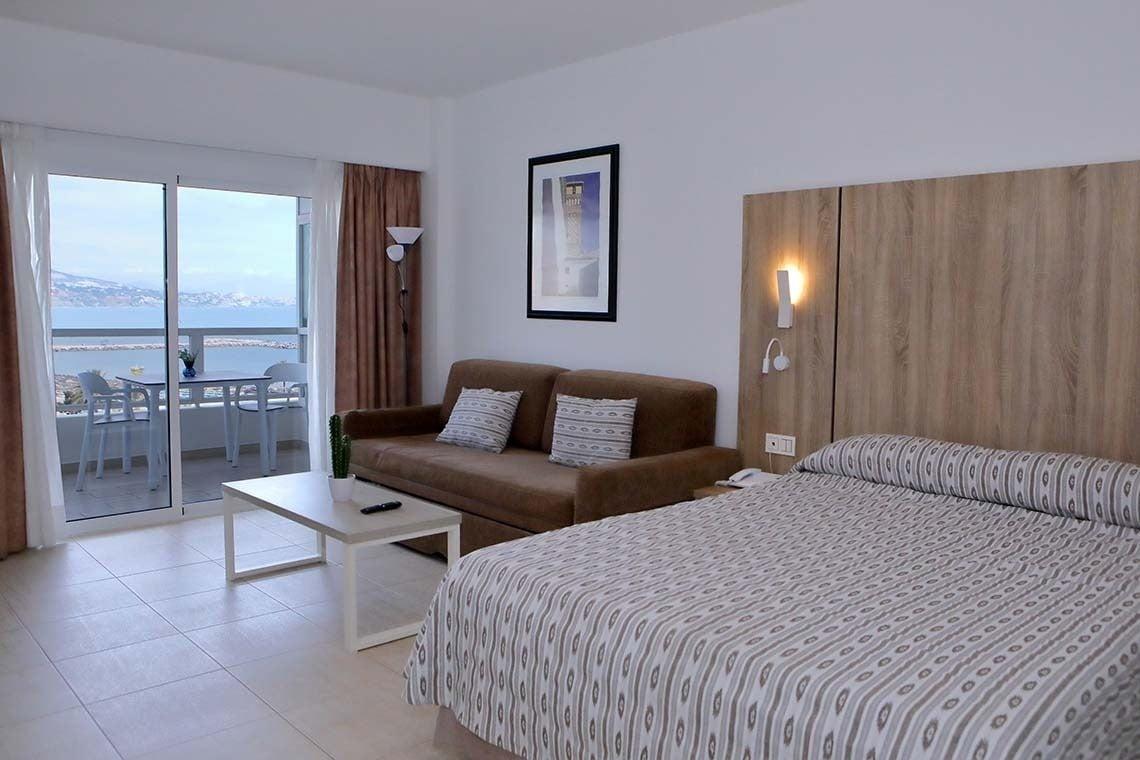 Double bed room with balcony views at the PYR Fuengirola