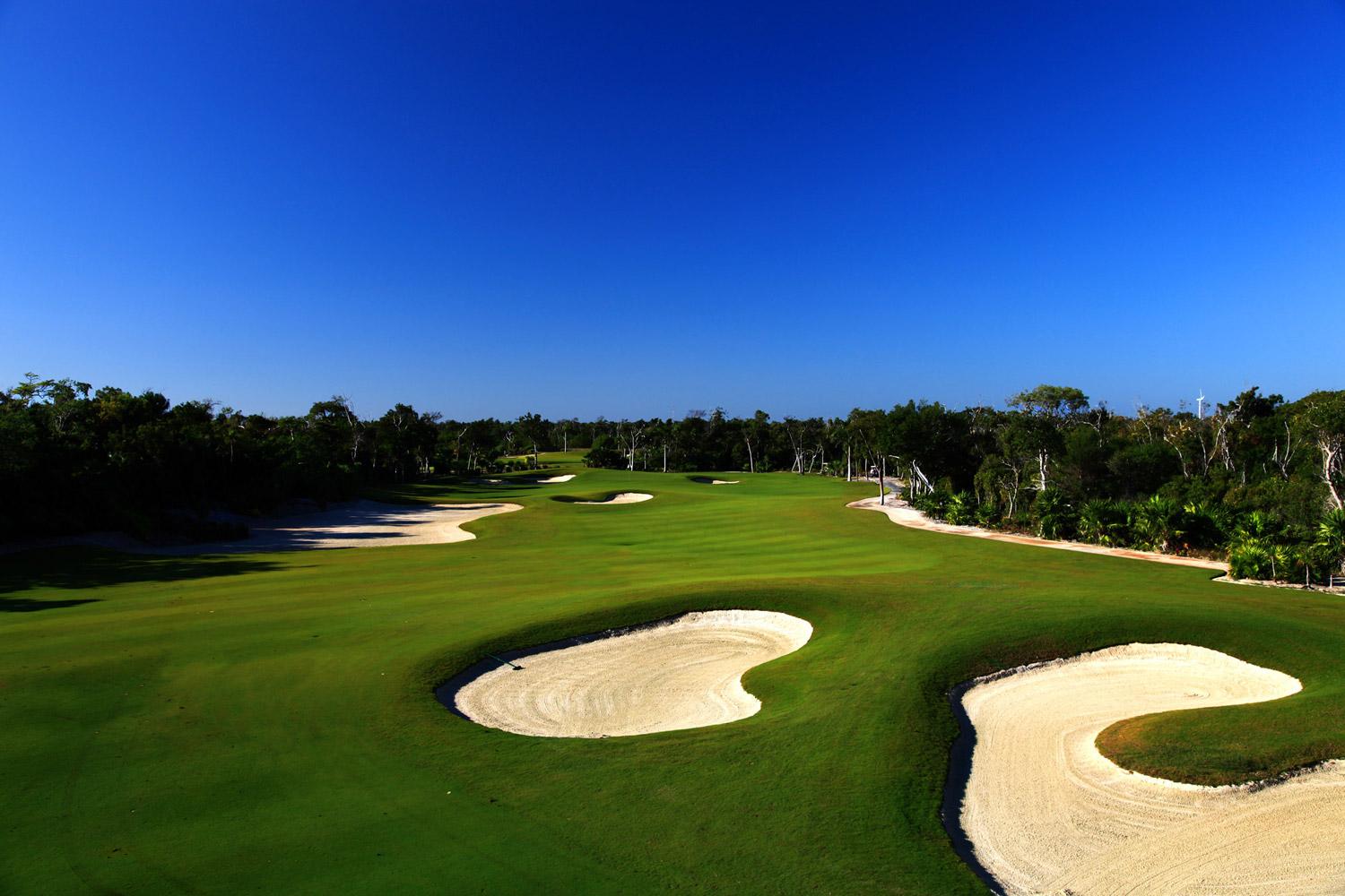 Well maintained fairway nestled with sand bunkers