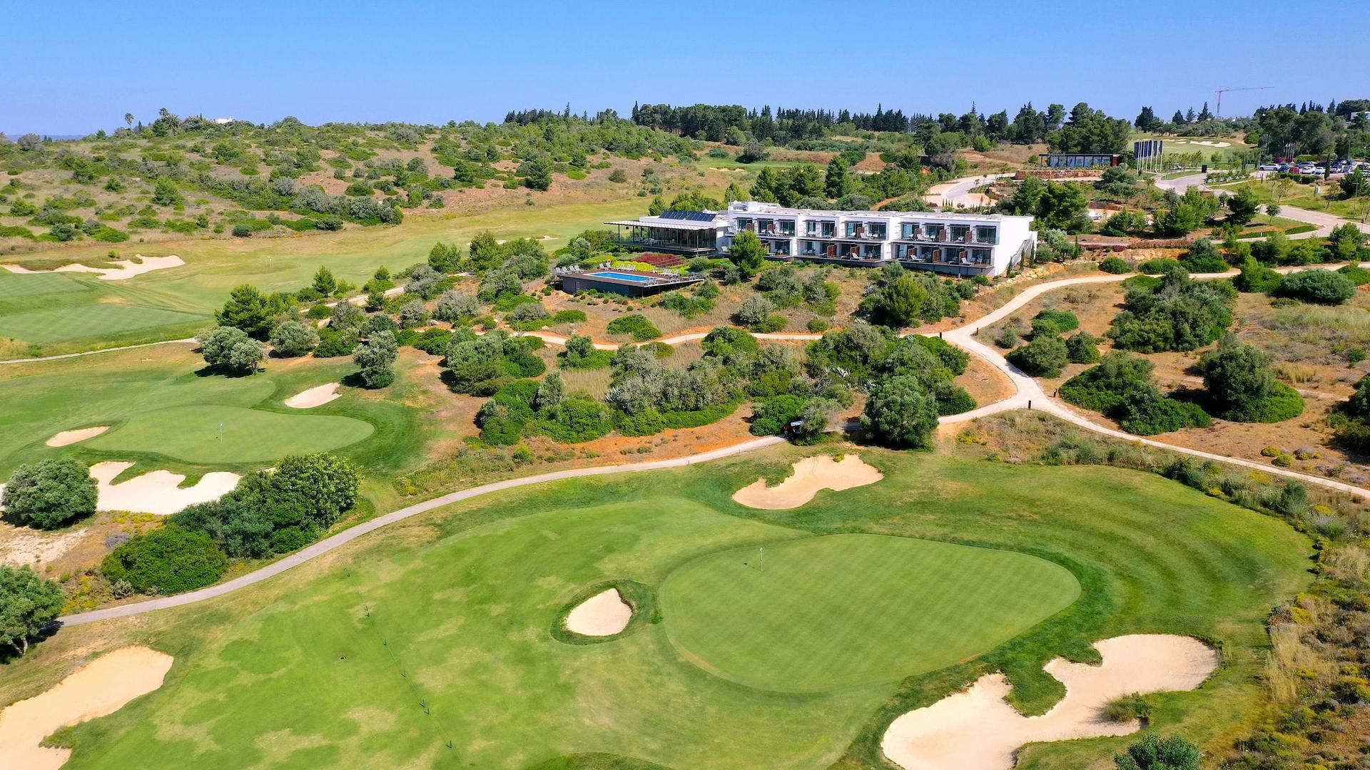 Aerial view of the Palmares Golf Course with the hotel in the background