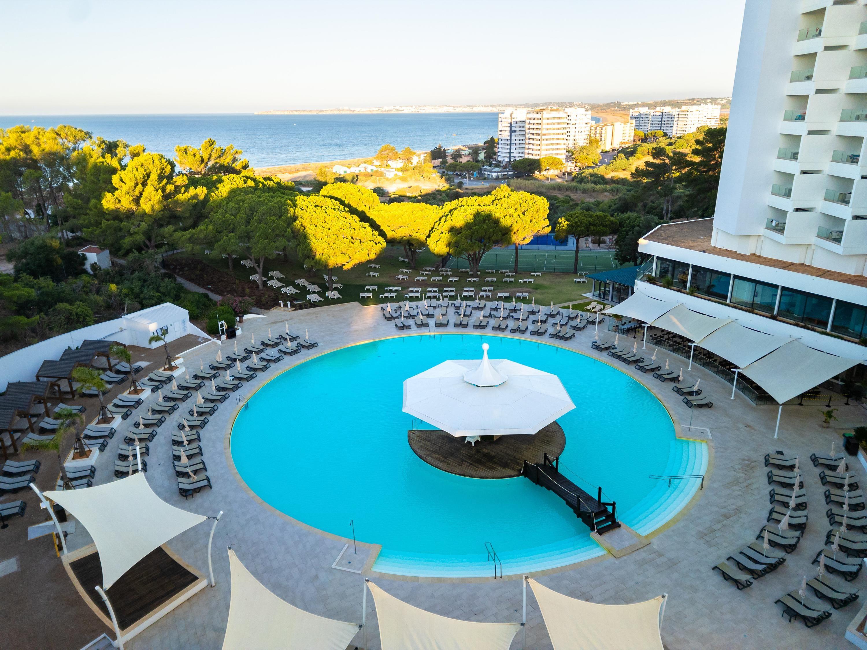 Overhead view of the outdoor swimming pool at Pestana Blue Alvor Beach