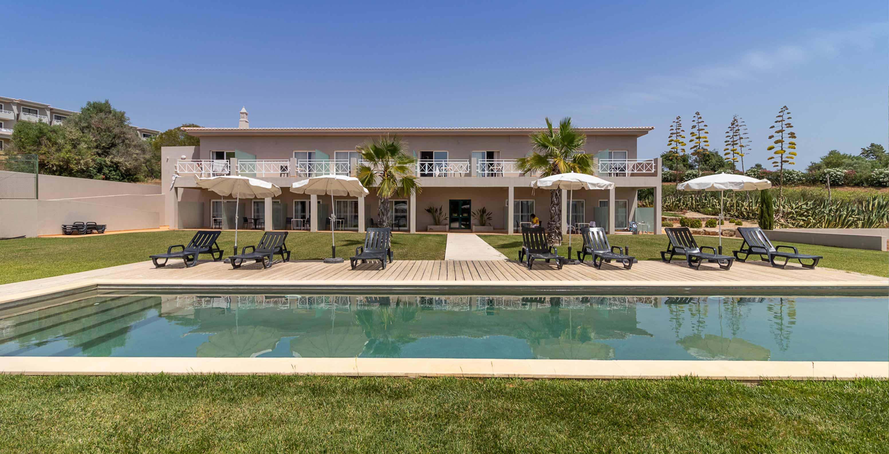 Outdoor swimming pool at the Pestana Gramacho Residences