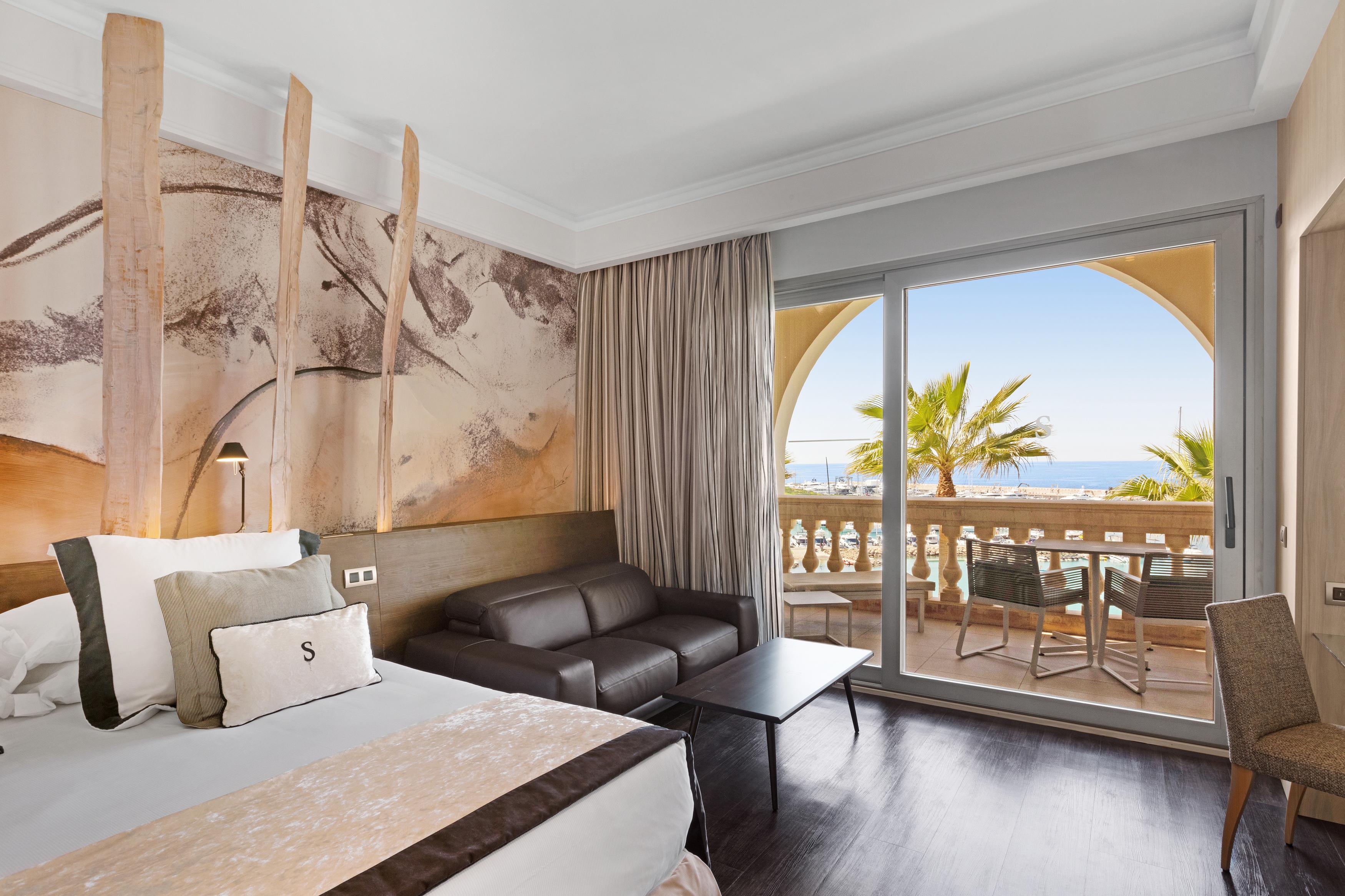 Double bed suite with balcony views at the Pure Salt Port Adriano