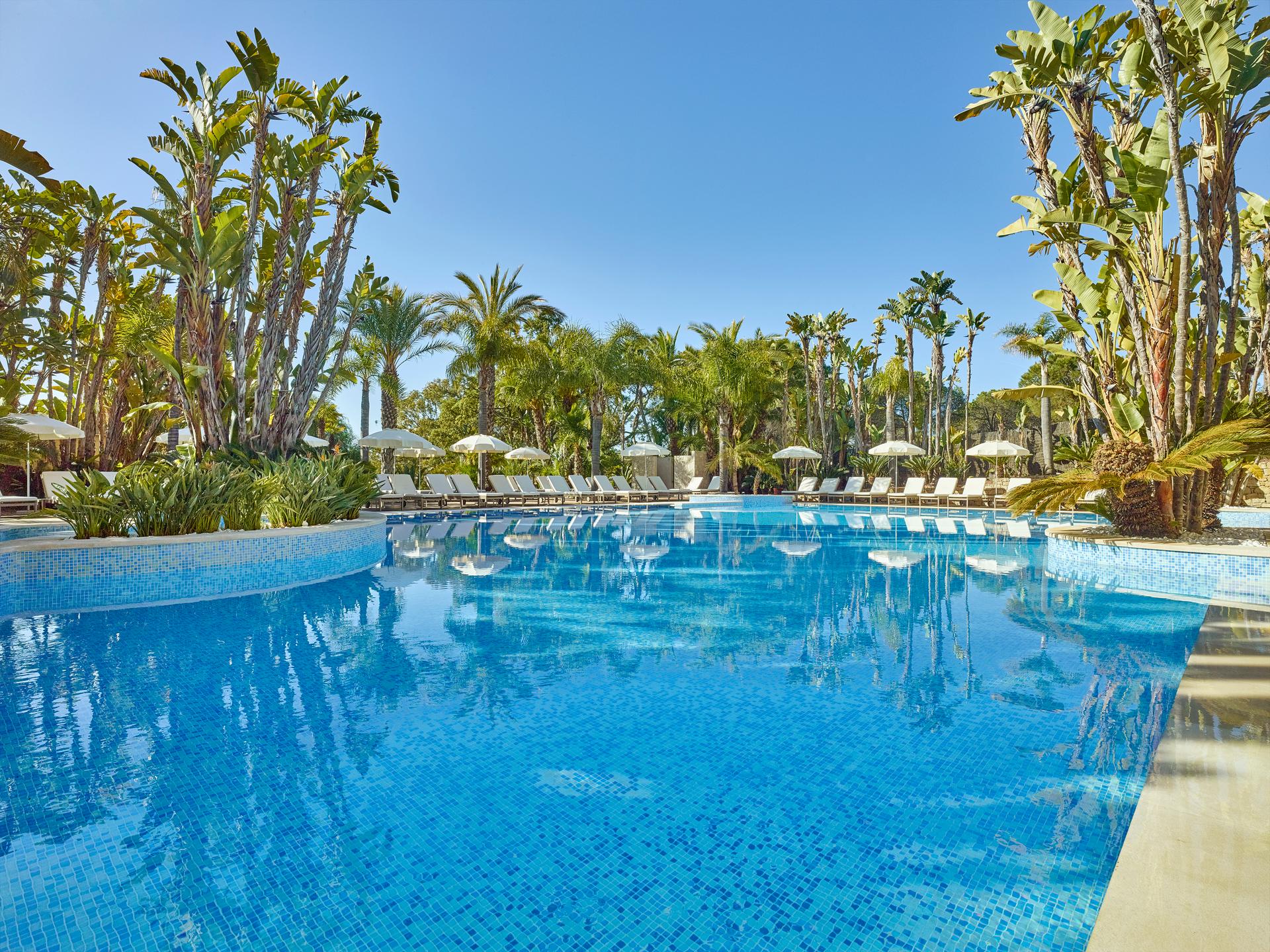 Outdoor swimming pool at Ria Park Garden