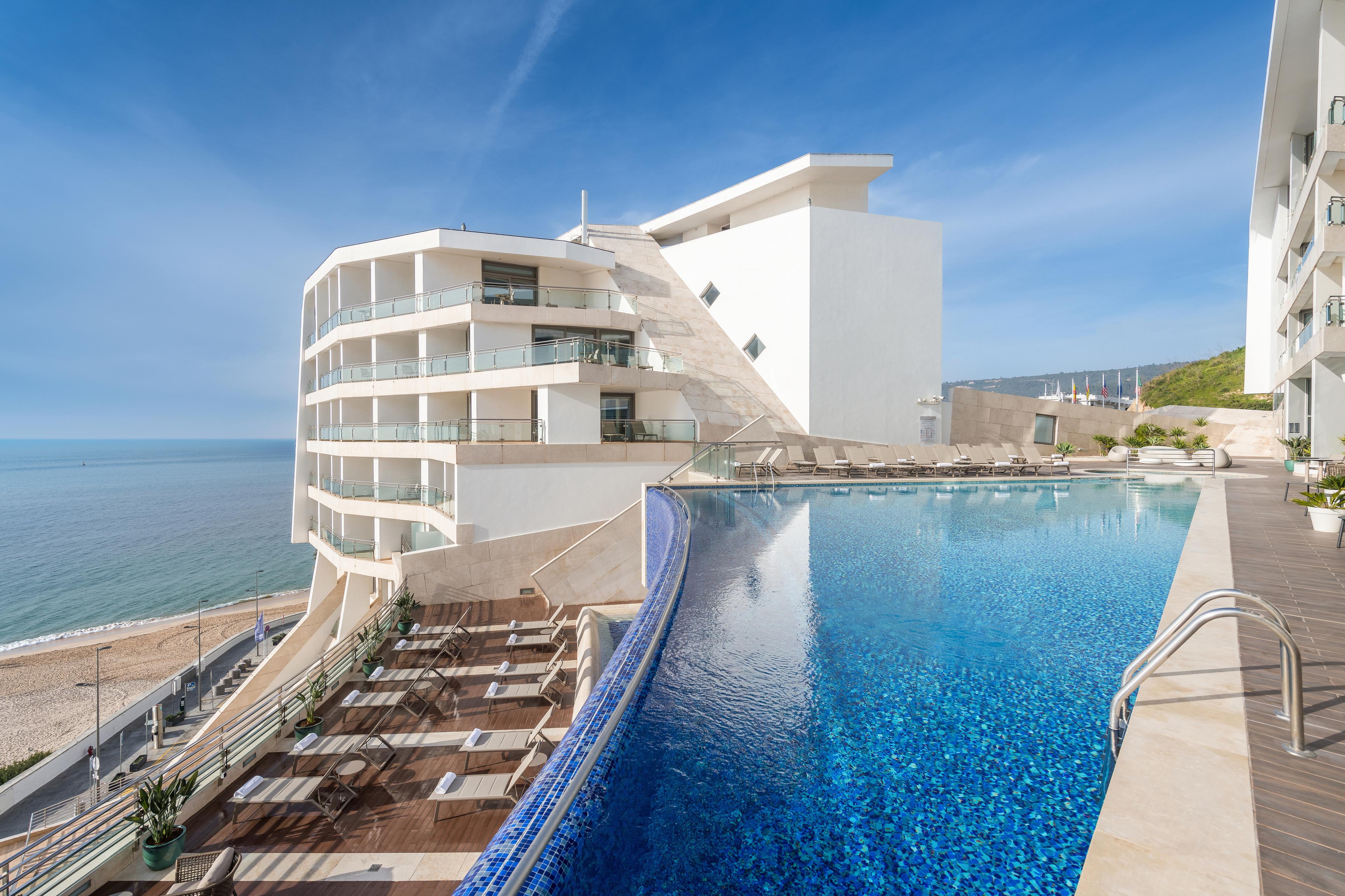 Panoramic view of the Sesimbra Oceanfront outdoor swimming pool