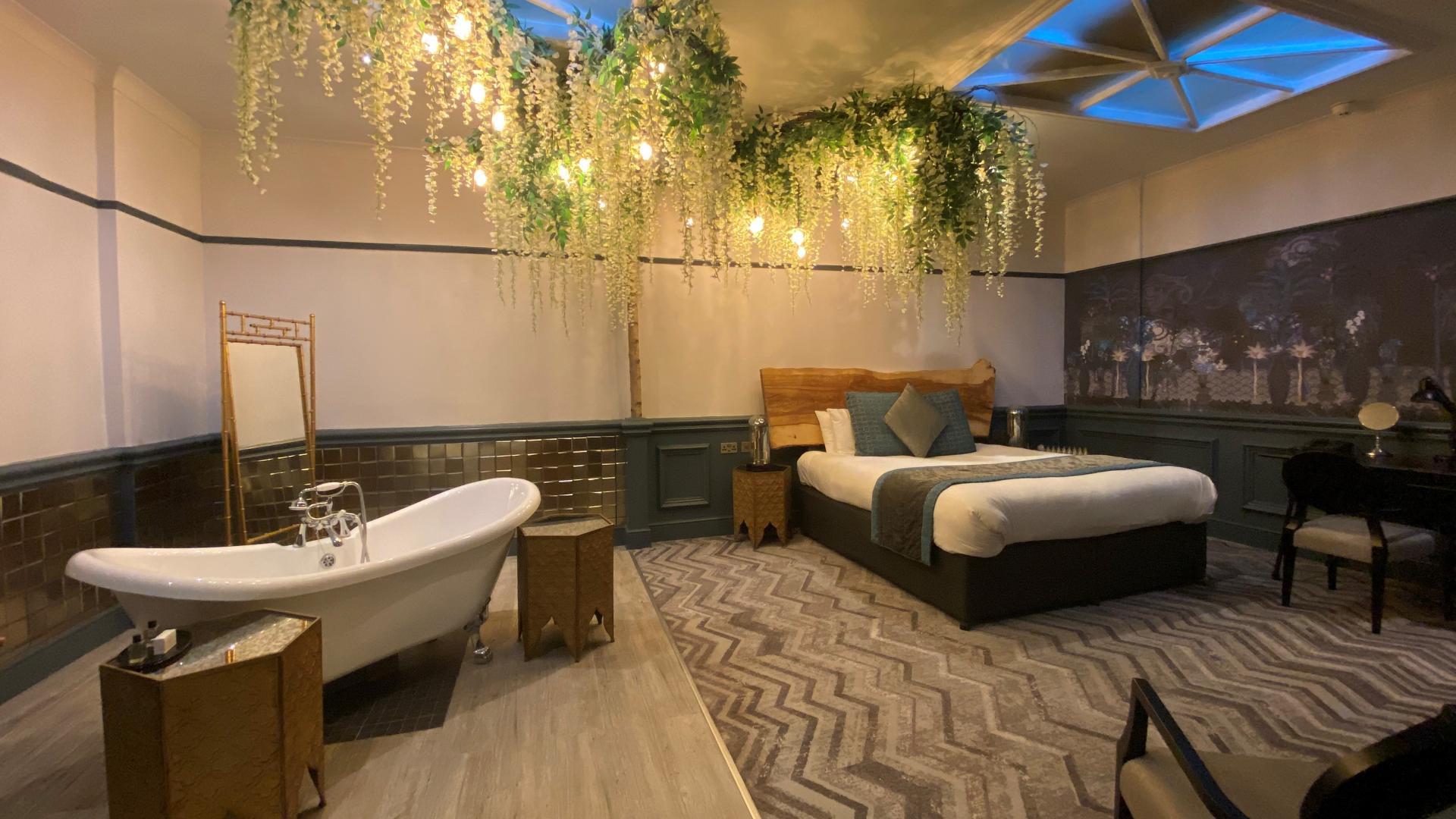 Double bed suite with a bath at the Shrigley Hall Hotel & Spa