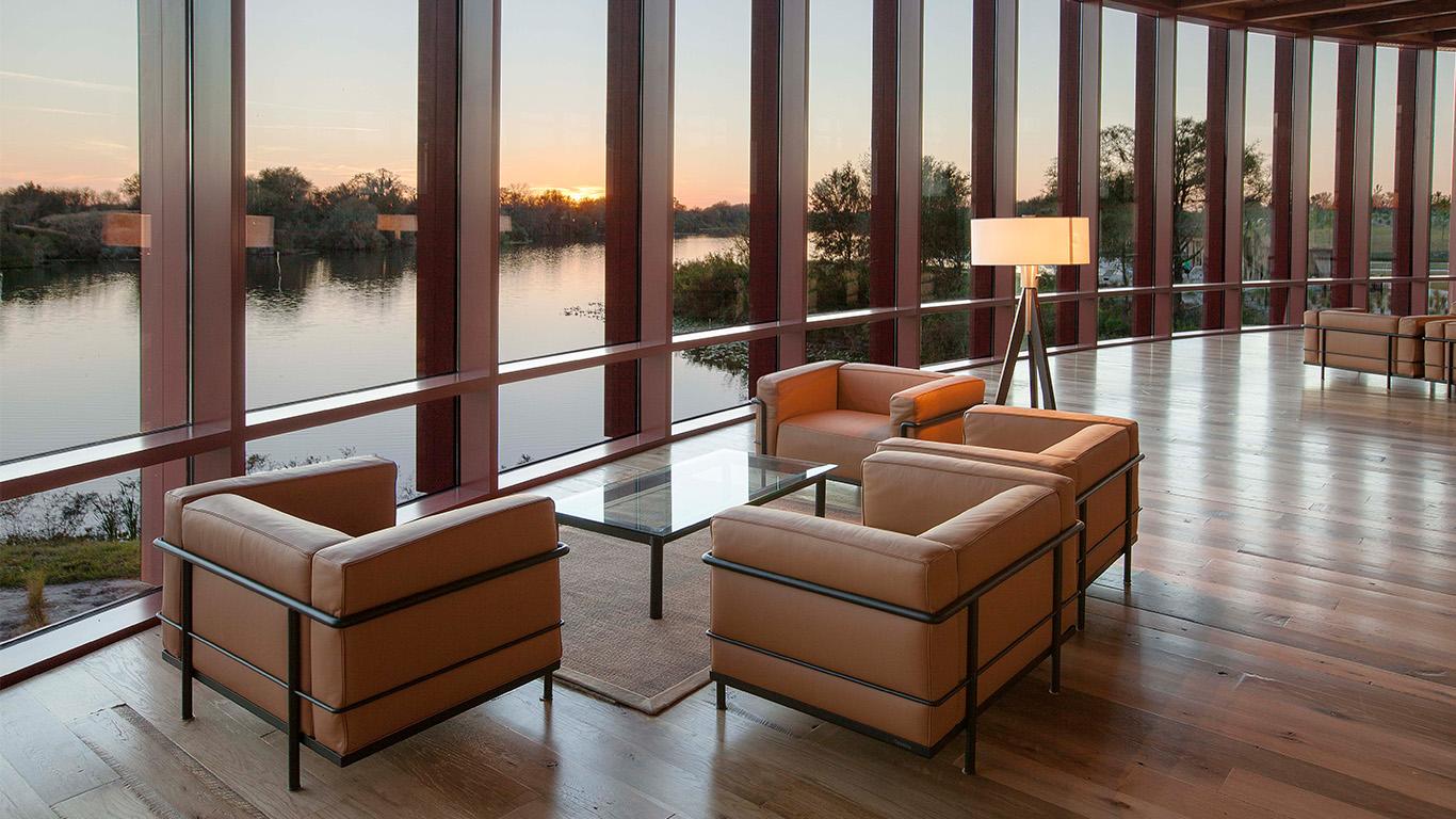 Indoor lounging area with panoramic window views