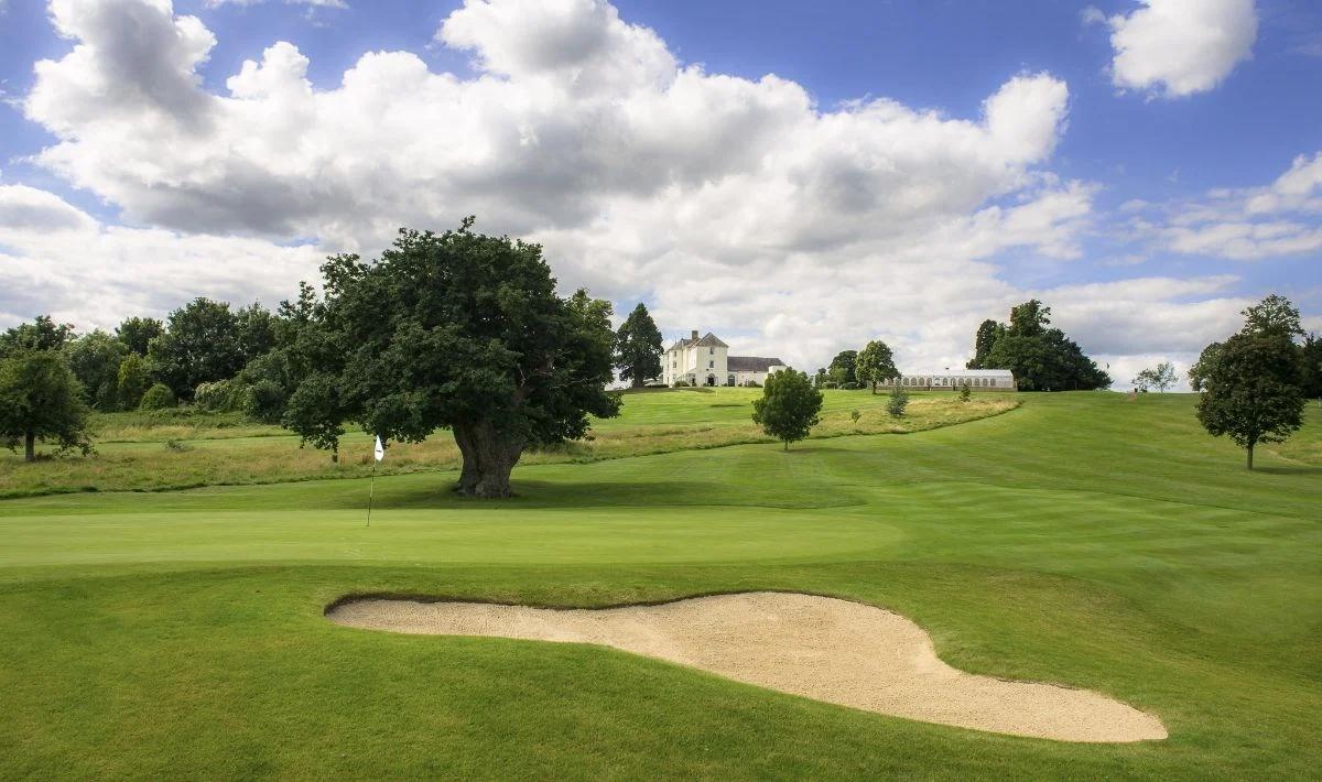 A well maintained fairway with a sand bunker at Tewkesbury Park
