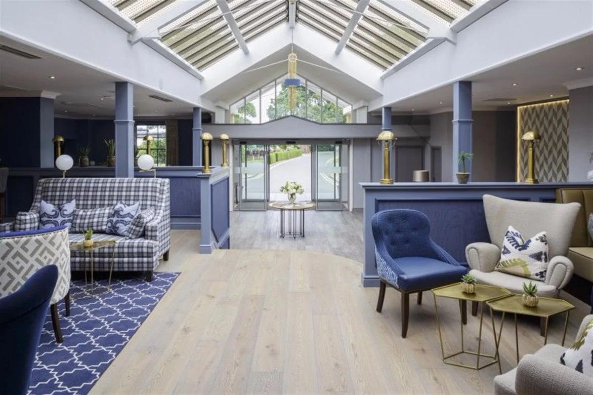 Lounging area in the reception of Tewkesbury Park Hotel