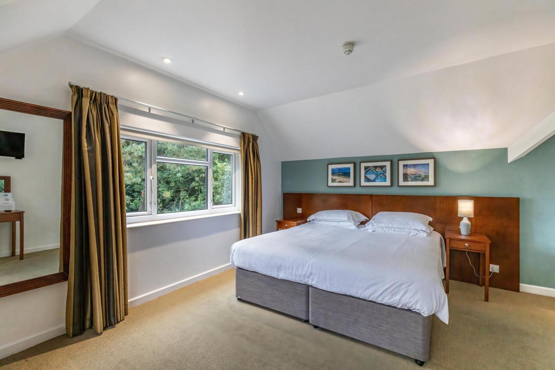 Double bed suite at The Lodge at Meyrick Park