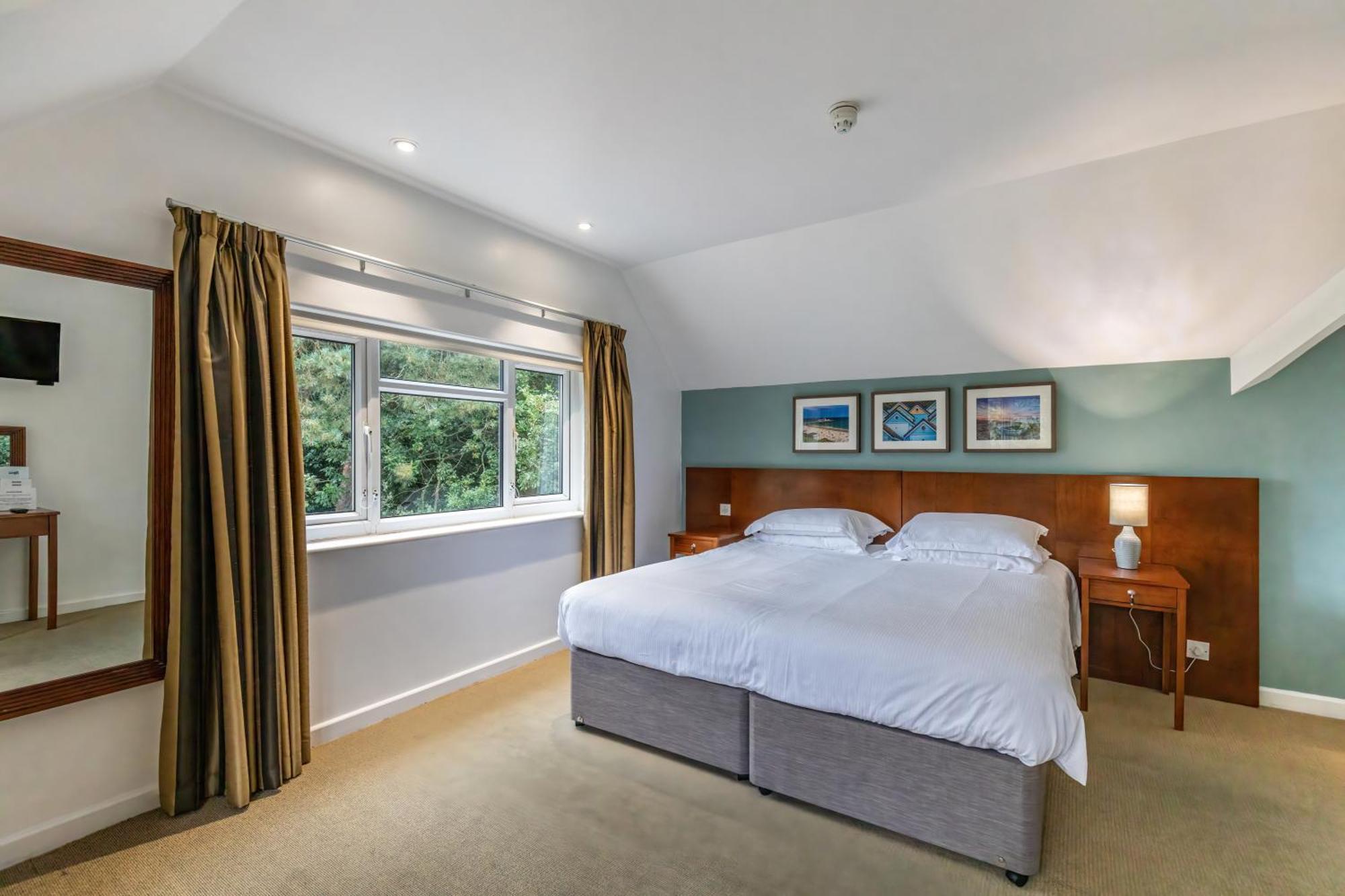 Double bed suite at The Lodge at Meyrick Park