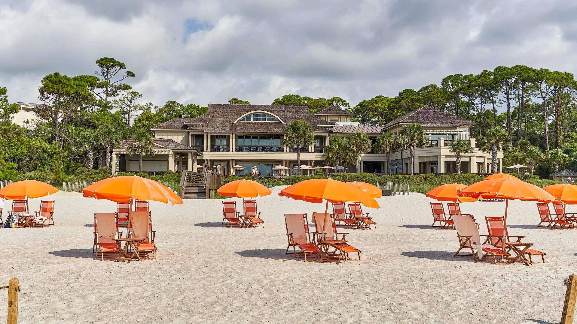 Beach with sunbeds at The Sea Pines Resort