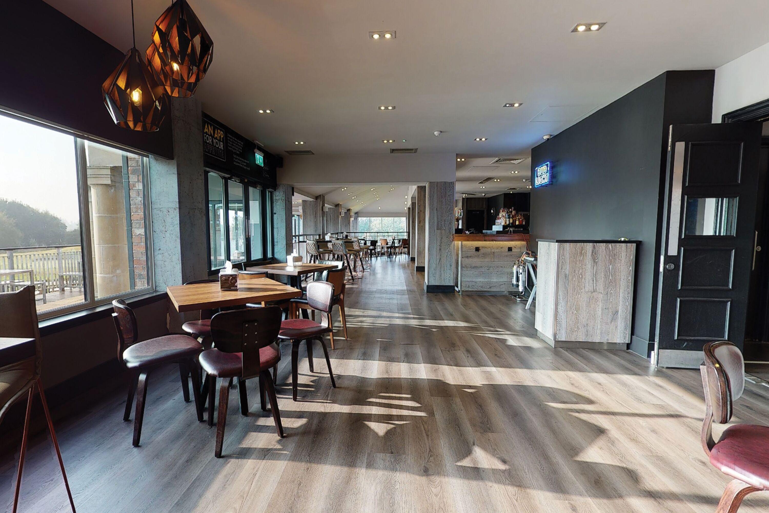 Indoor dining area at the Village Hotel Herons Reach