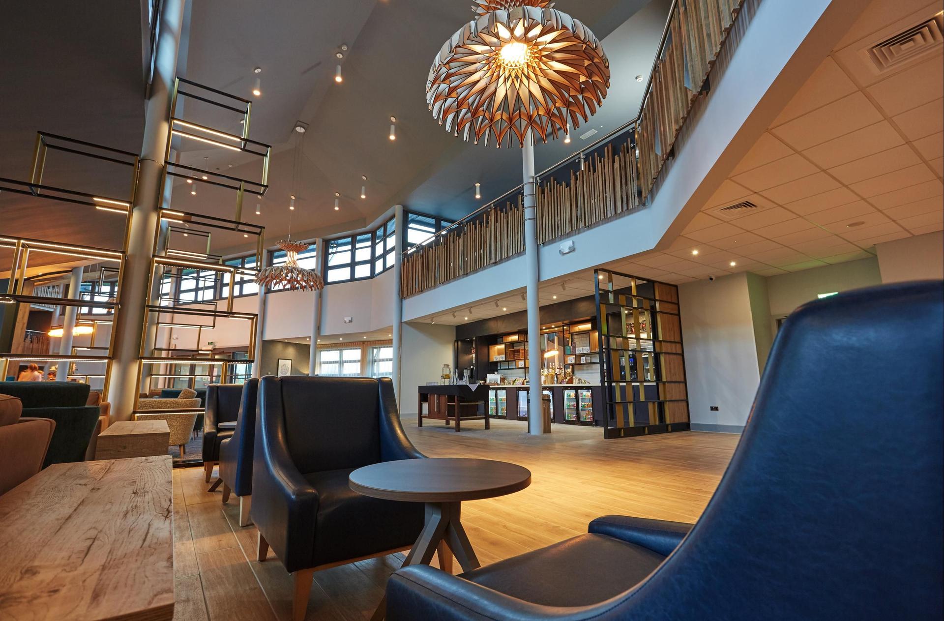Indoor lounging area in the reception at Wychwood Park Hotel