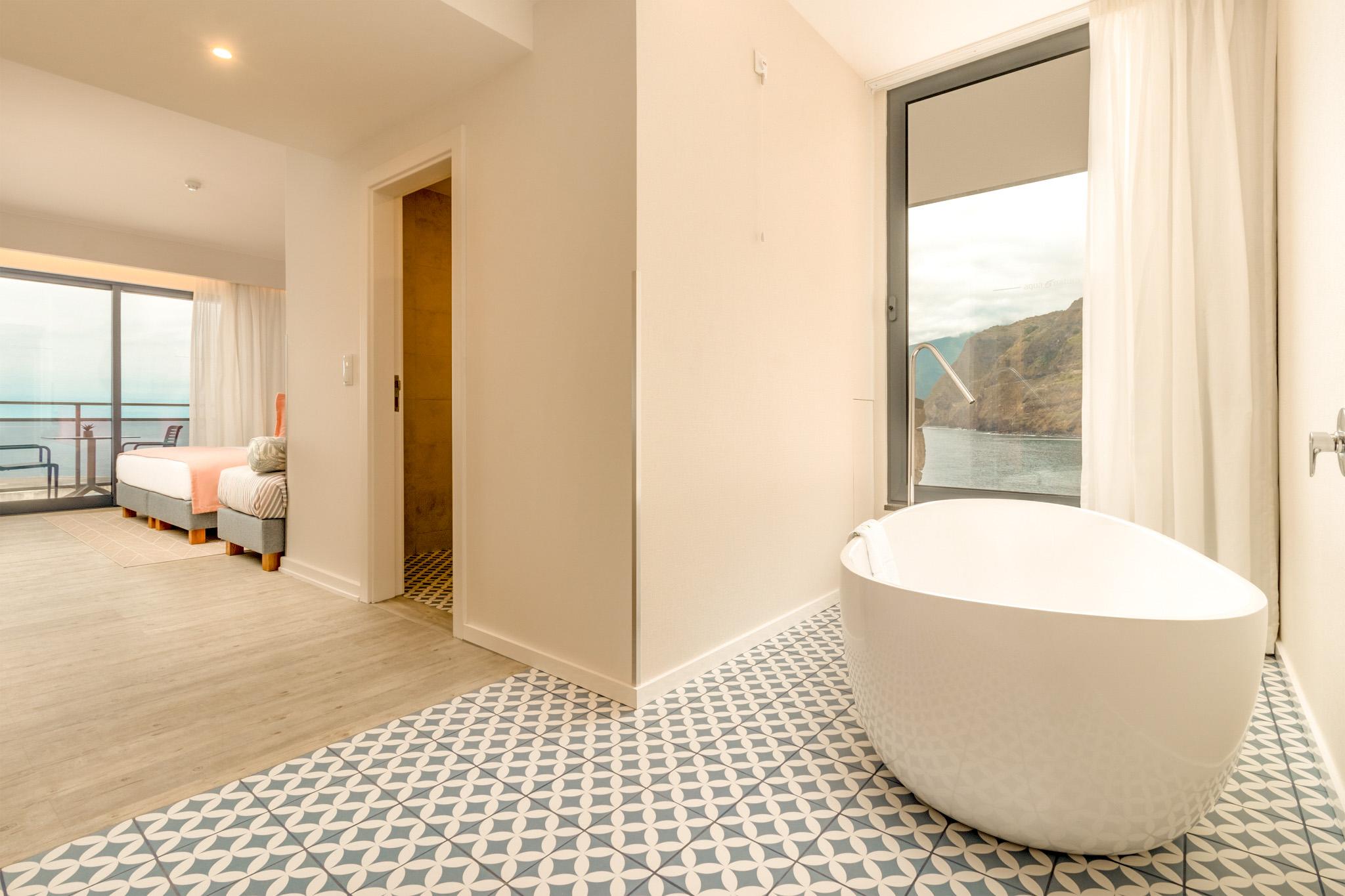 Bathroom as part of a double bed suite at Aqua Natura Bay