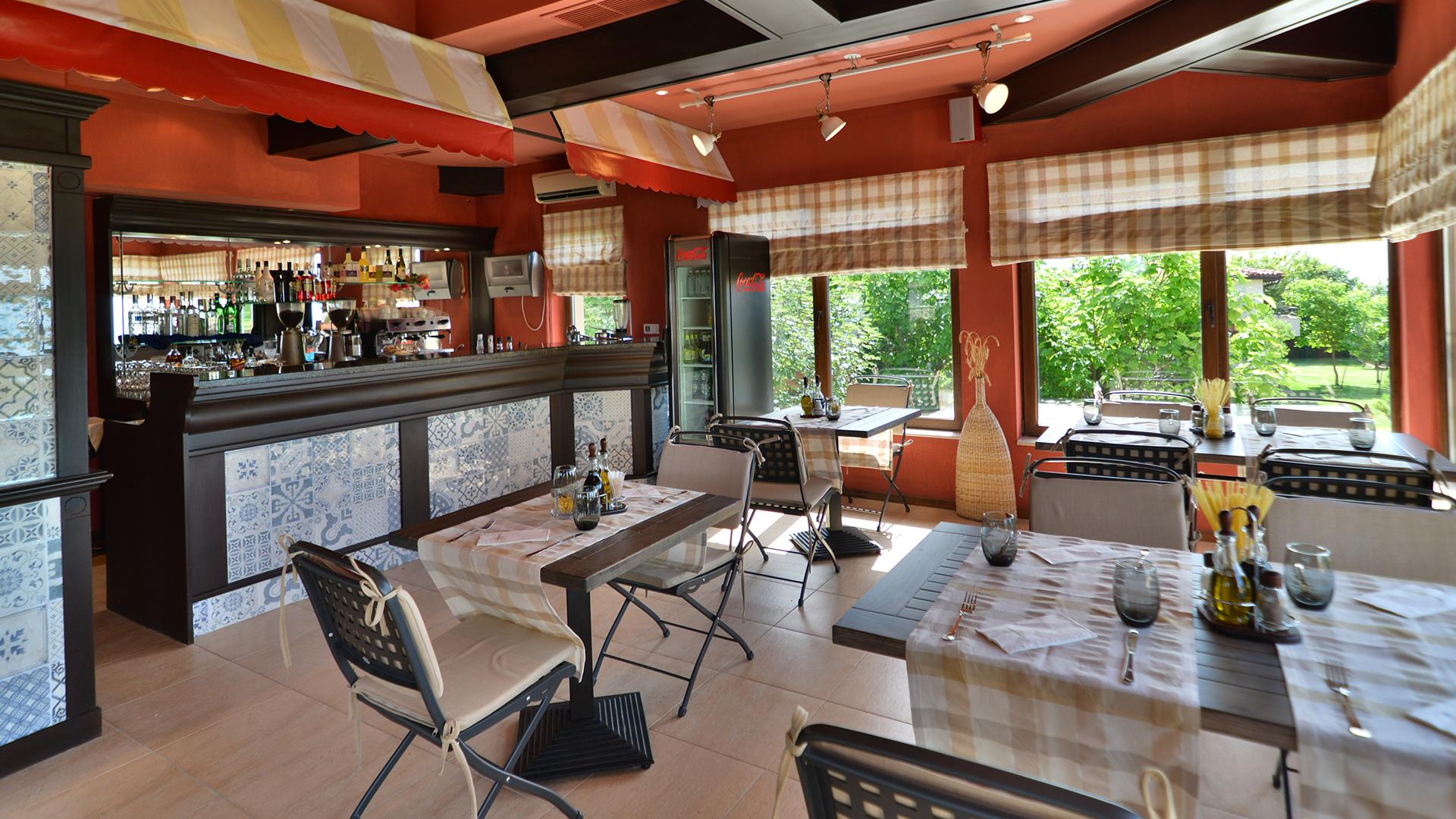 Indoor dining and bar at BlackSeaRama Golf & Villas