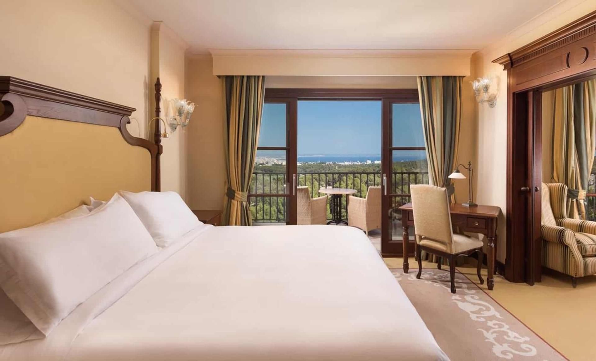 Double bed suite with balcony views at Castillo Hotel Son Vida