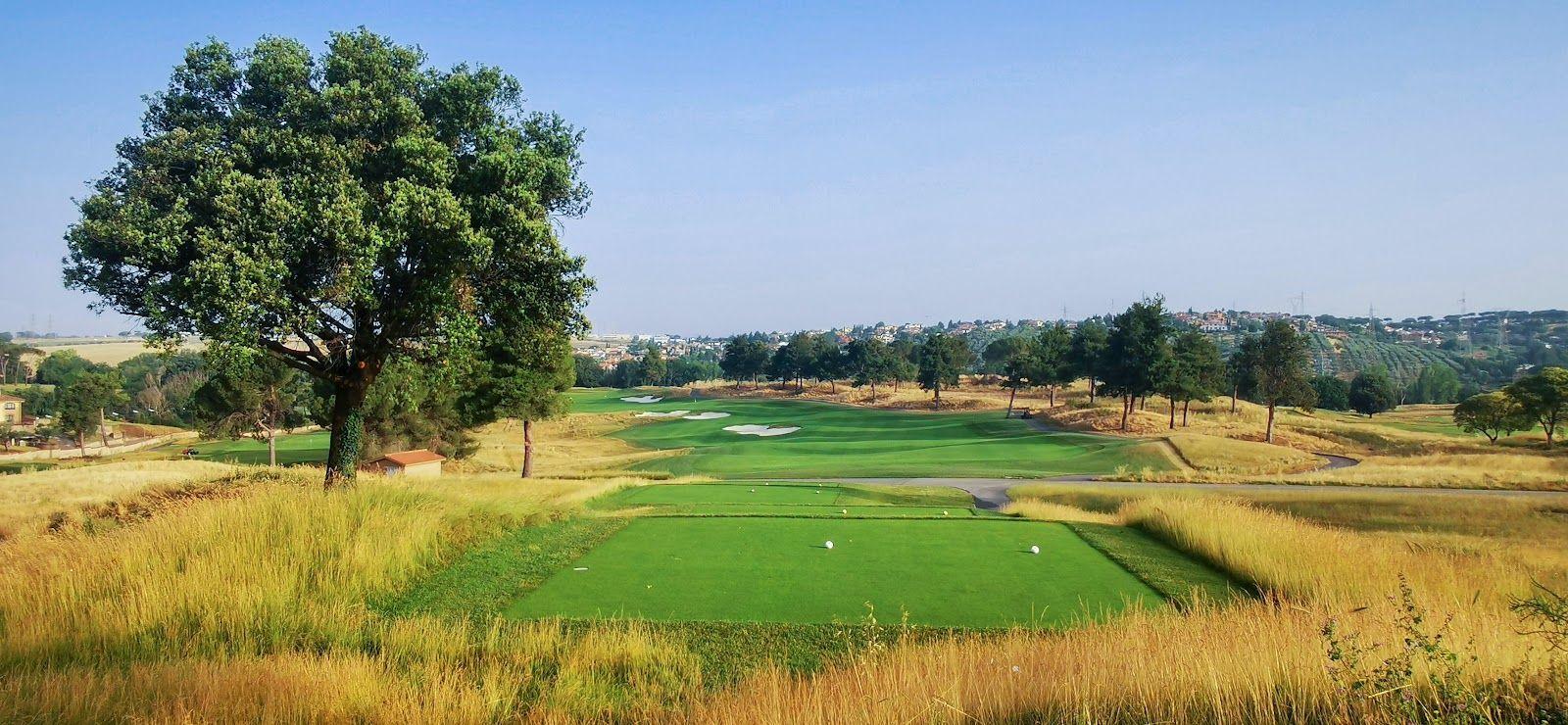 Tee box leading to a well maintained green at Marco Simone Golf