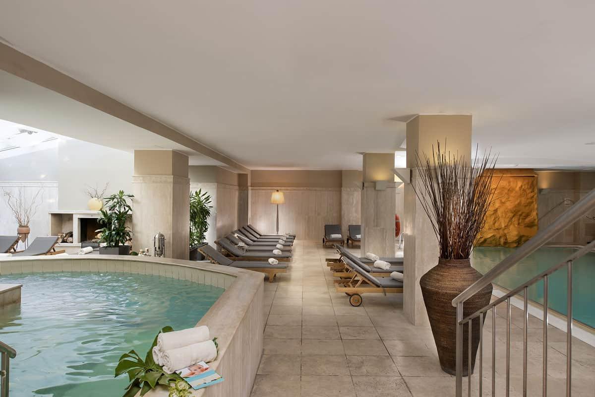 Indoor pool and jacuzzi as part of the spa facilities at Crowne Plaza Rome