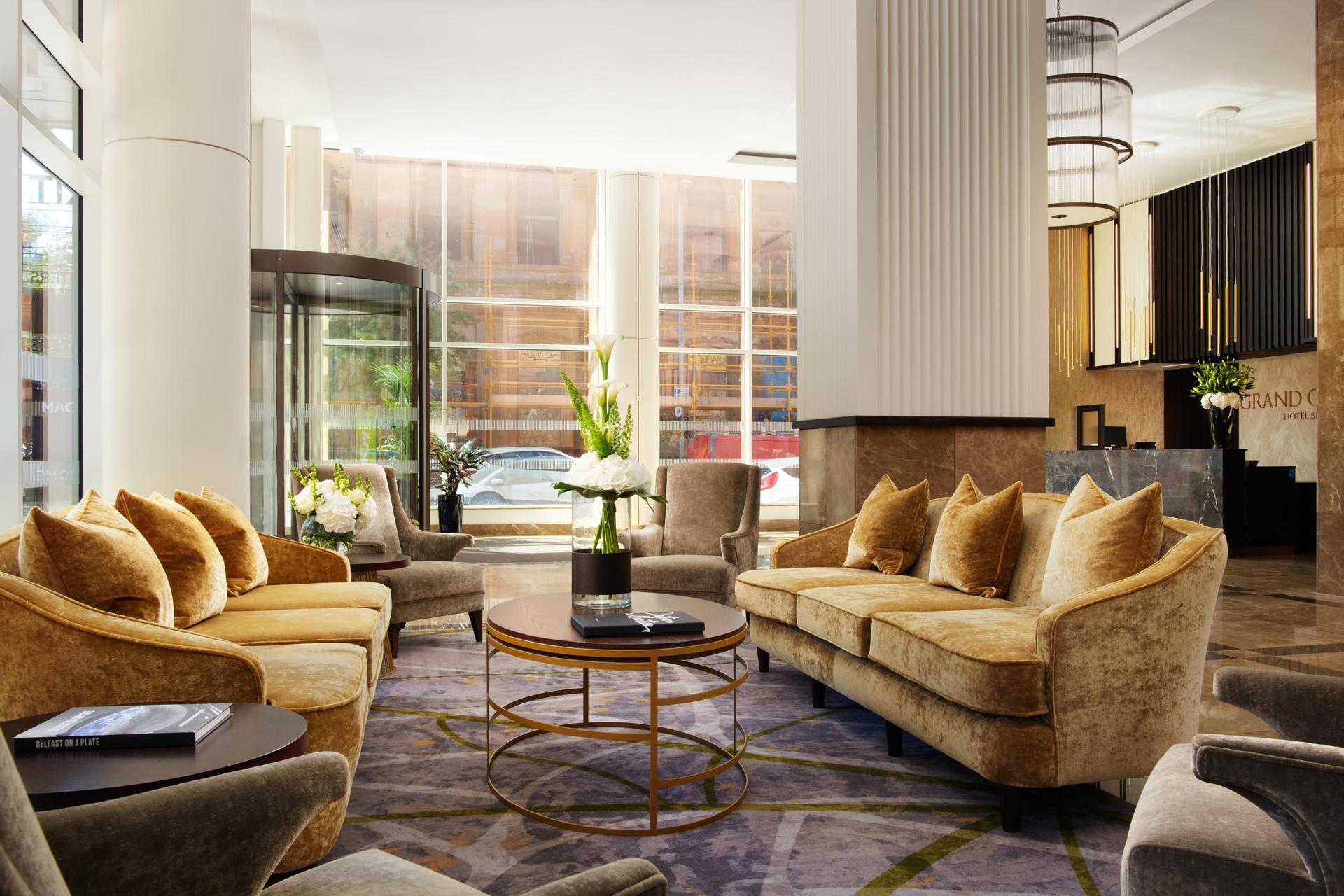 Lounging area in the reception at Grand Central Hotel Belfast