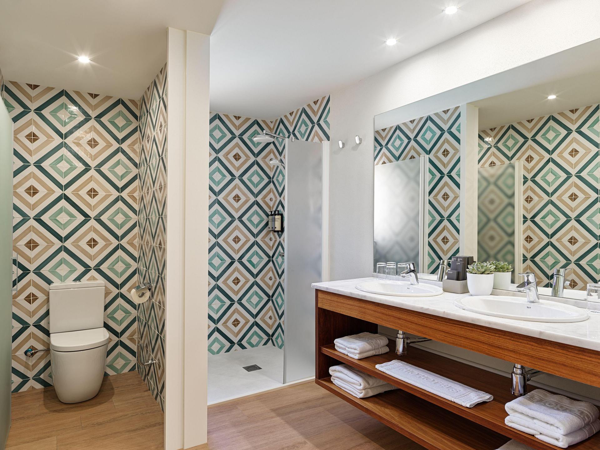 Bathroom as part of a suite at H10 Salou Princess