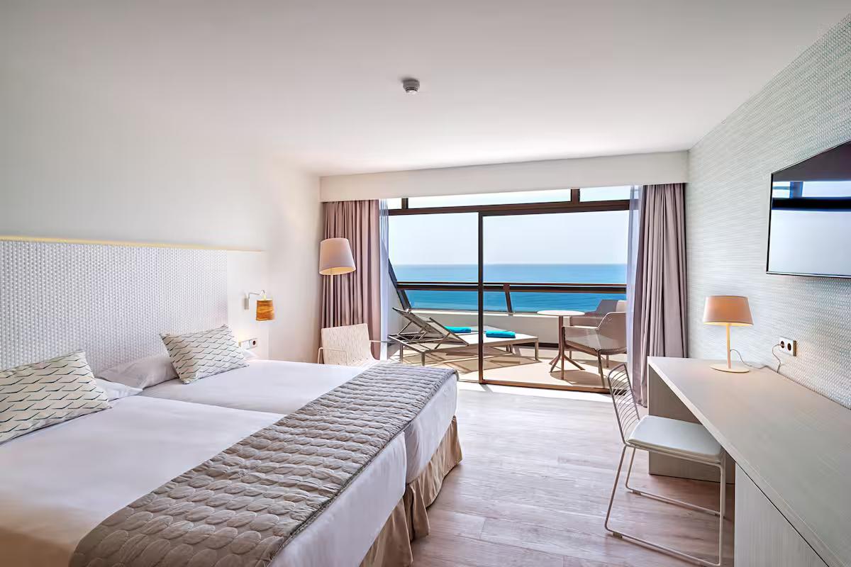 Double bed suite with balcony ocean views at Hotel Don Gregory by Dunas