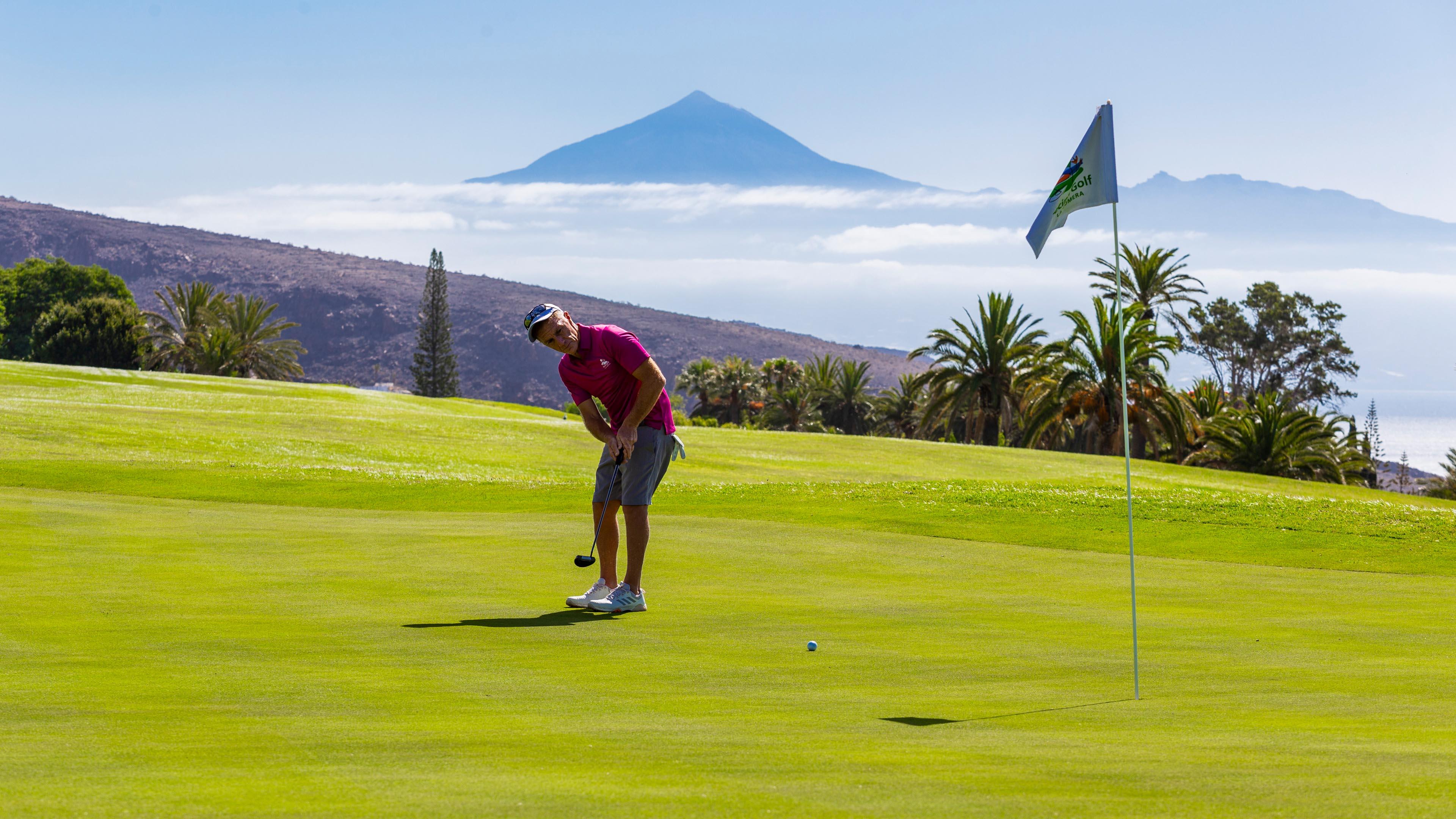 Golfer putting on a smooth green at Tecina Golf