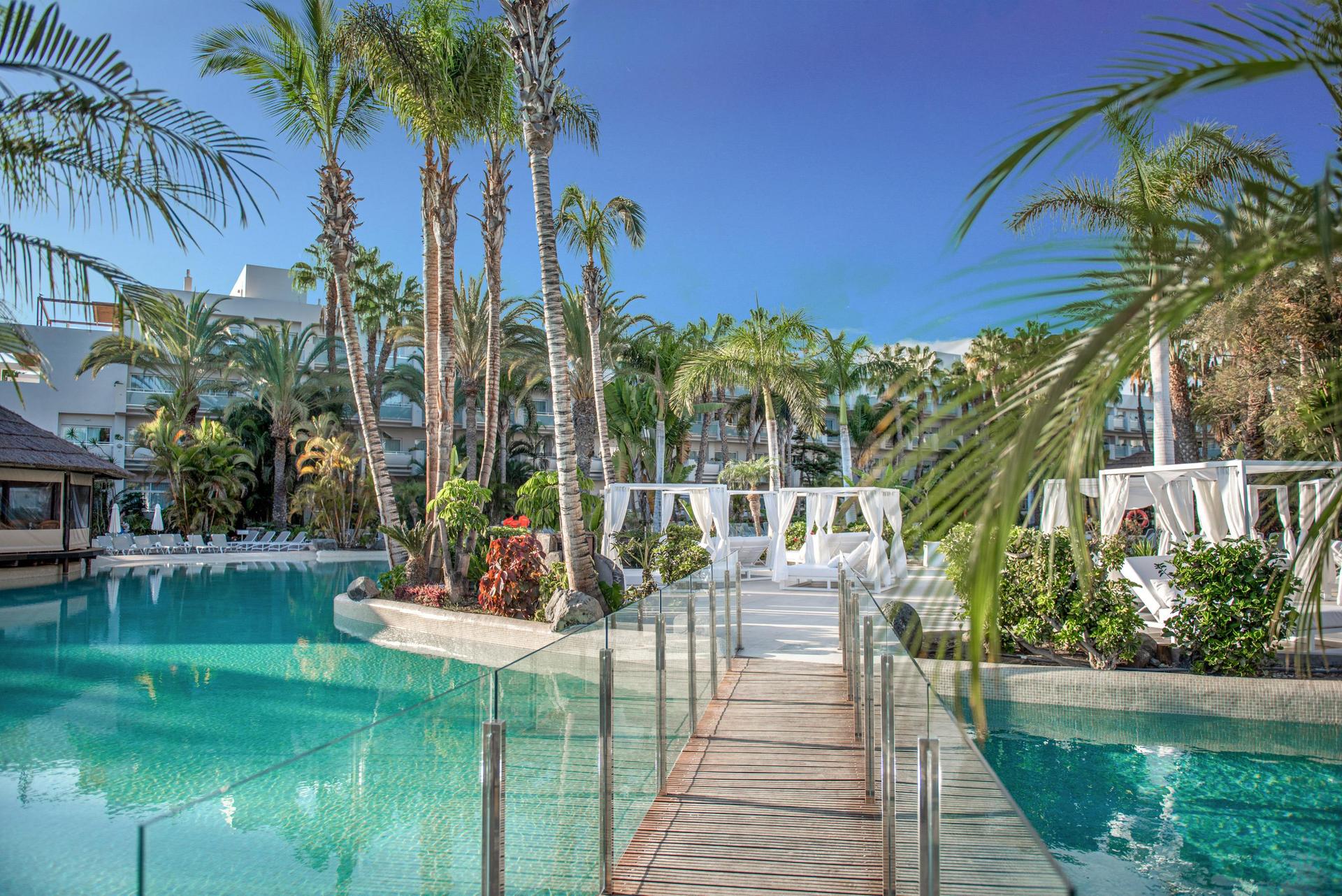 Bridge to navigate the outdoor swimming pool at Hotel Tabaiba Princess