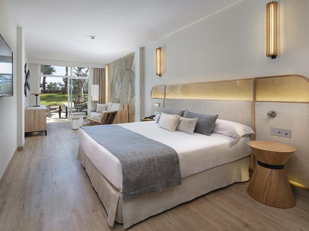 Spacious double bed suite with a patio space