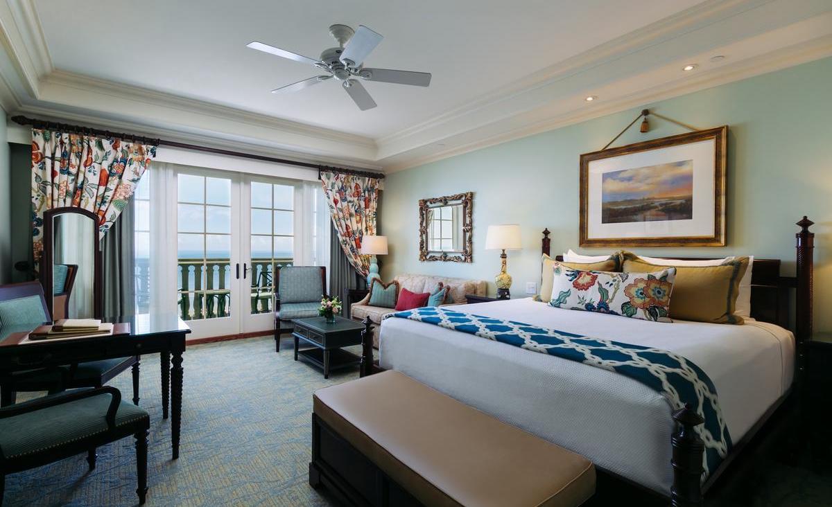 Spacious double bed suite at Kiawah Island Golf Resort with balcony views of the coast