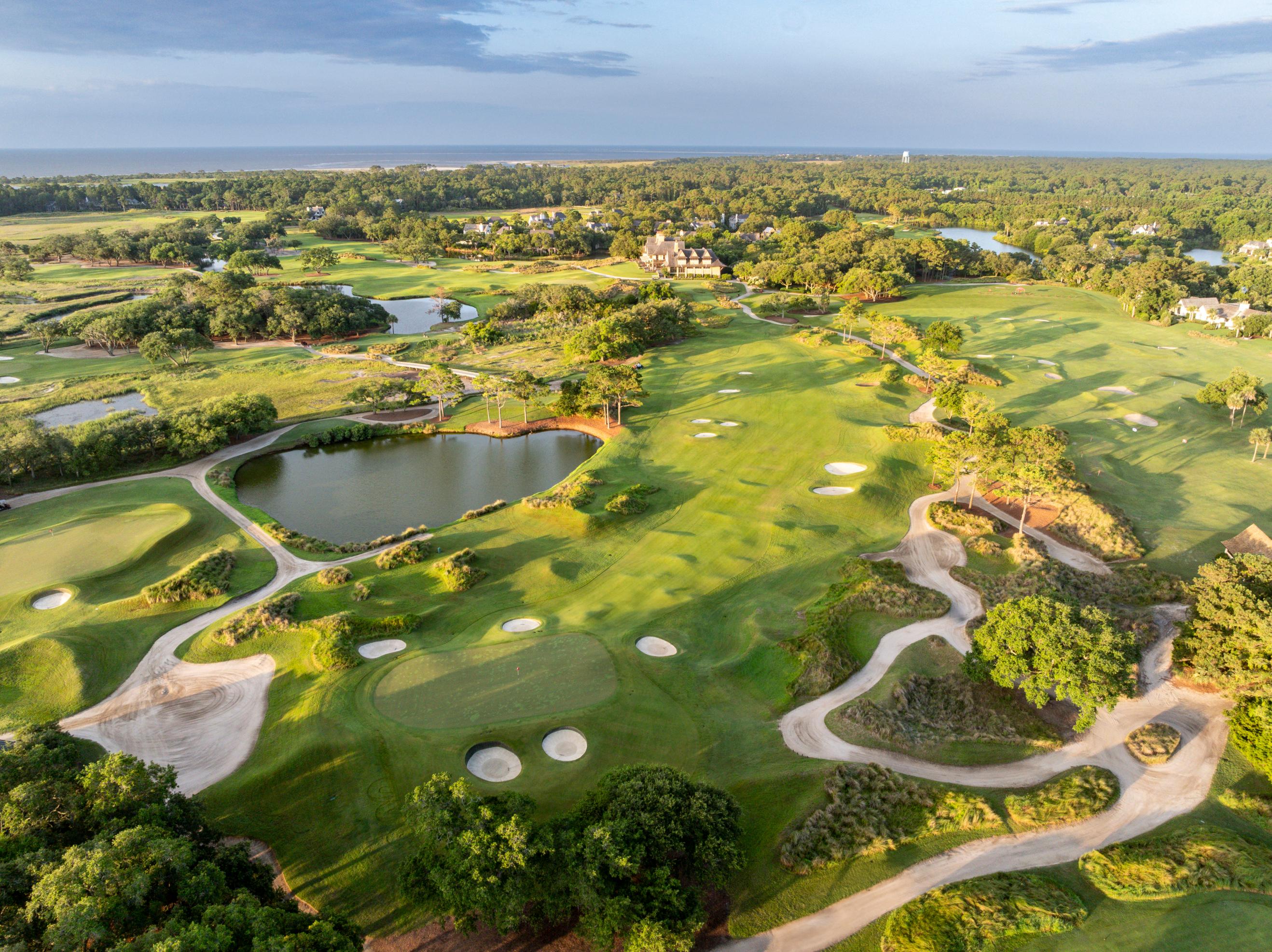 Overhead view of winding fairways nestled with sand bunkers at Kiawah Island Golf Resort