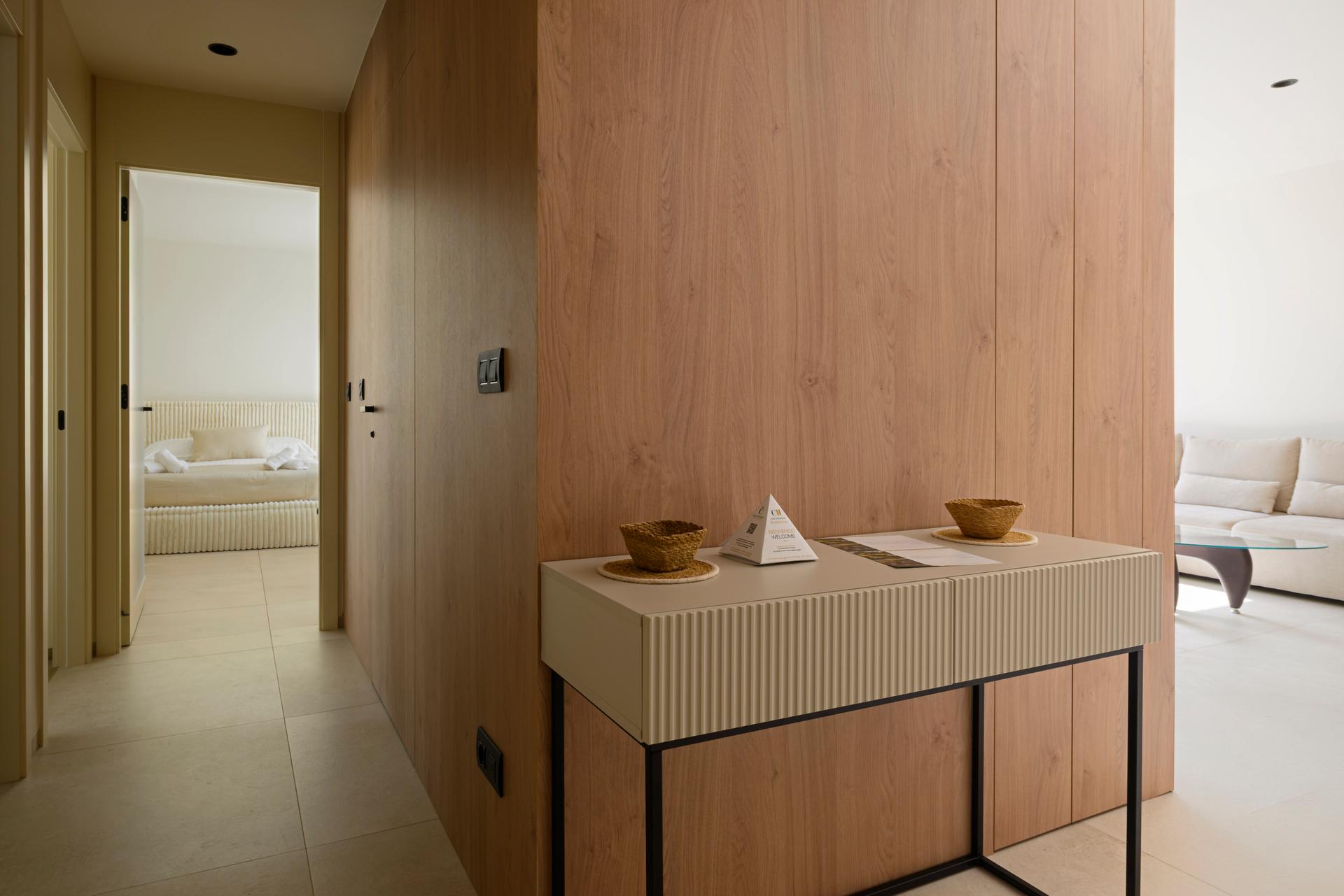 Corridor connecting the living room and bedroom at Las Colinas Residences