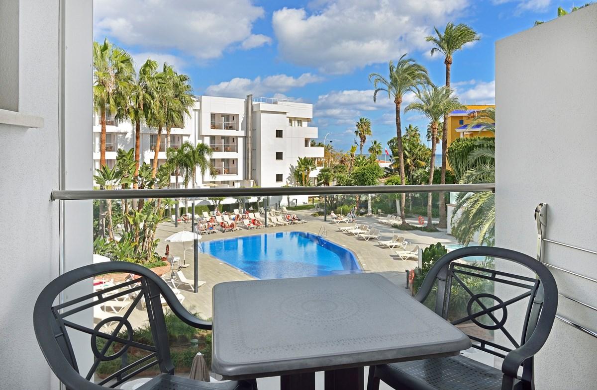 Balcony views of the outdoor swimming pool at Melia Sol Don Pedro