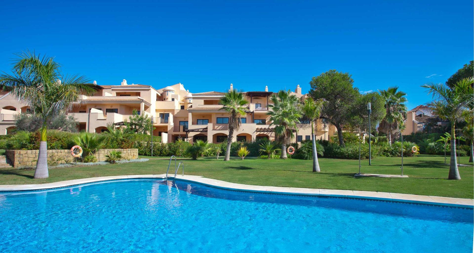 Outdoor swimming pool at Mimosas Suites Banus