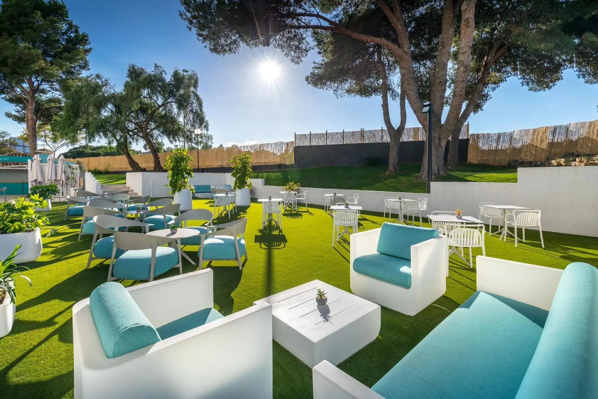 Sun shining down on an outdoor lounging area at Occidental Puerto Banus