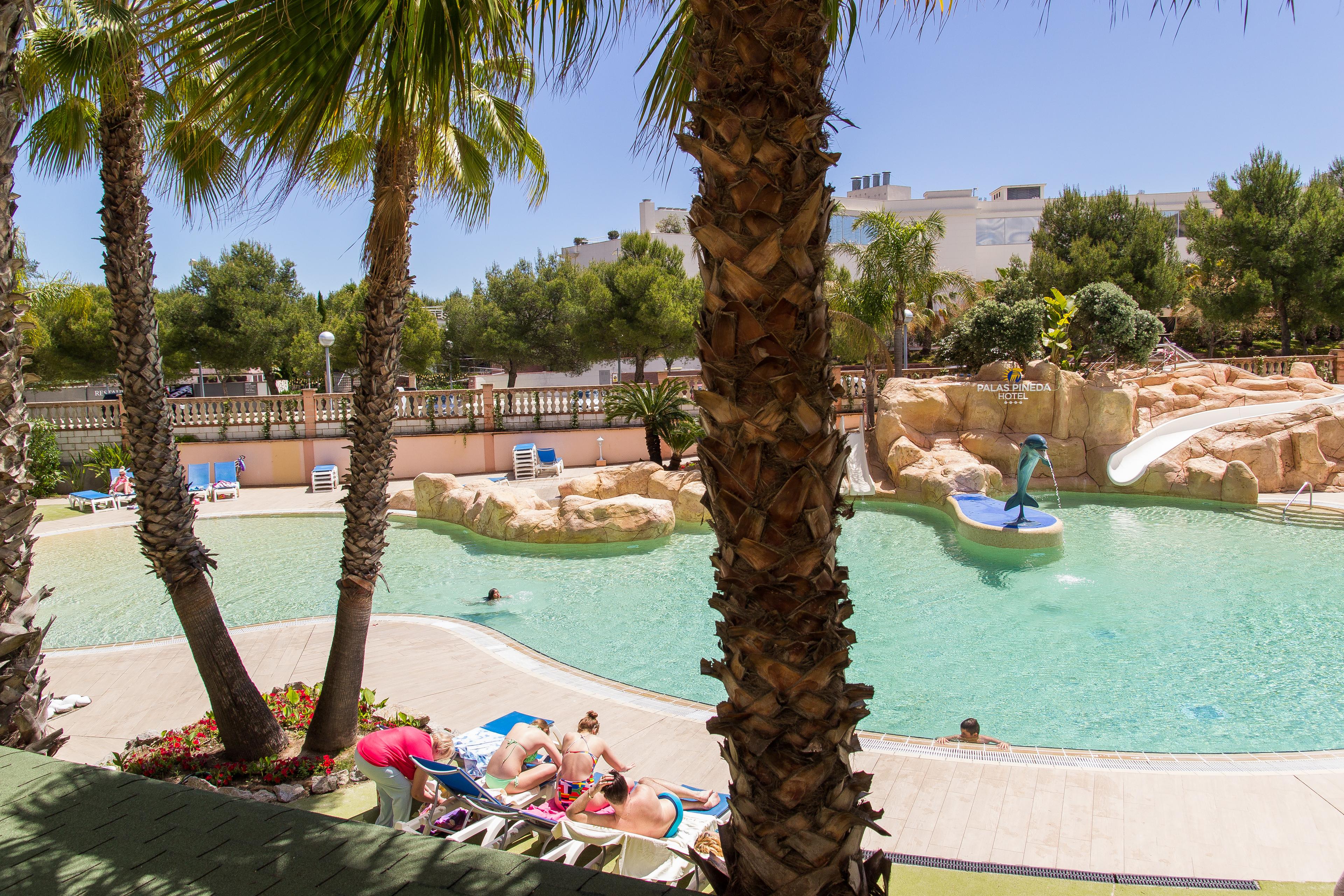 Outdoor swimming pool at Palas Pineda Hotel