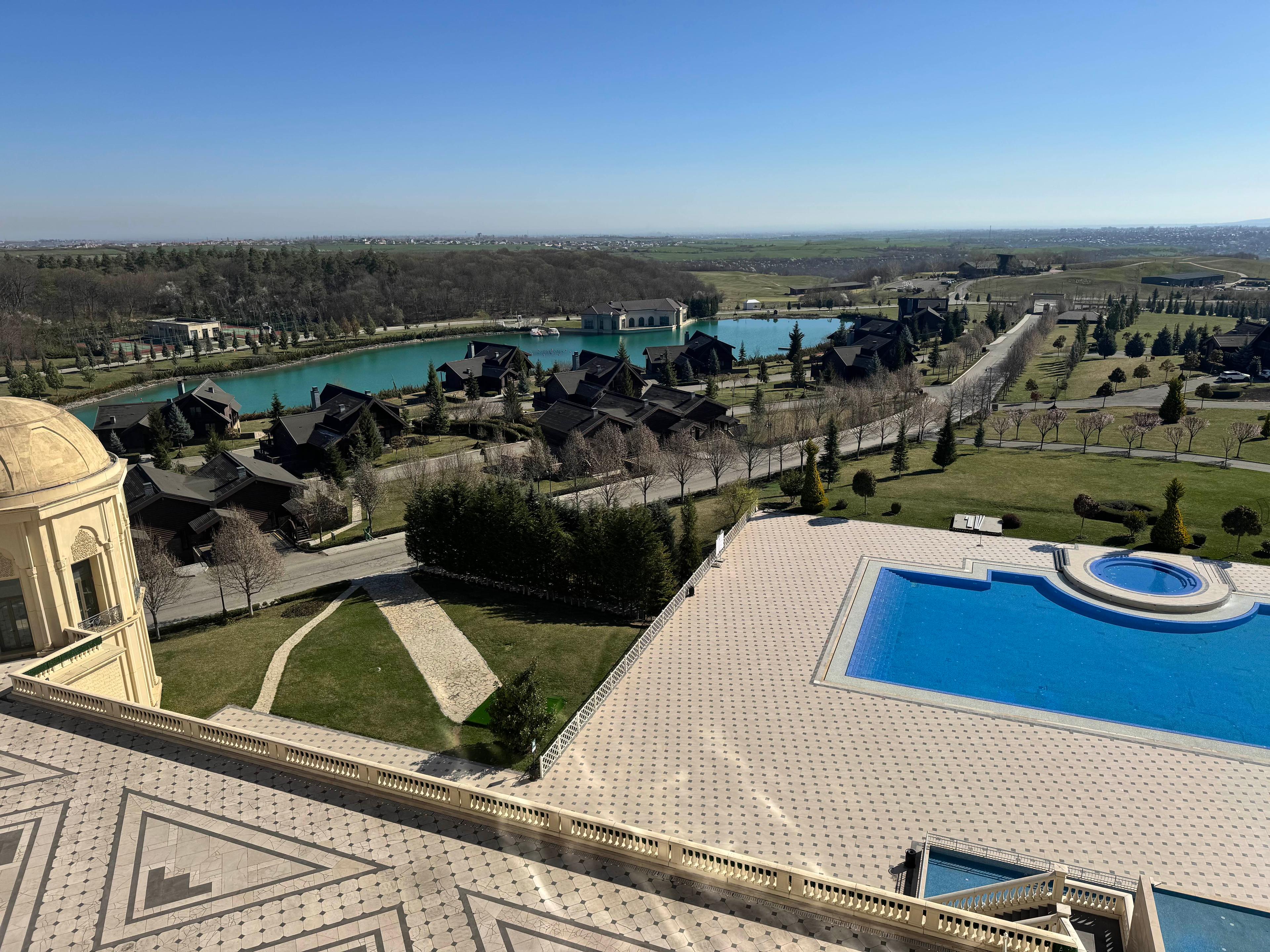 Overhead view of the outdoor pool at Quba Palace Hotel