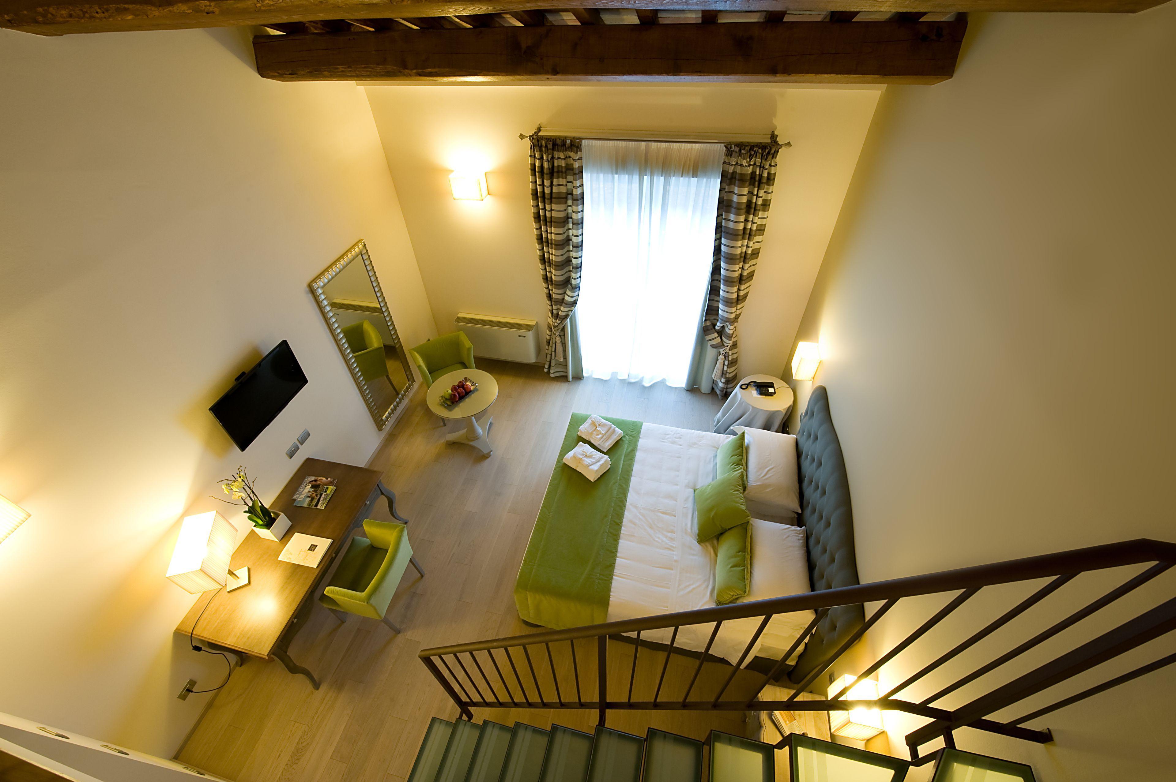 Overhead view of a double bed suite at Relais Dell'Olmo