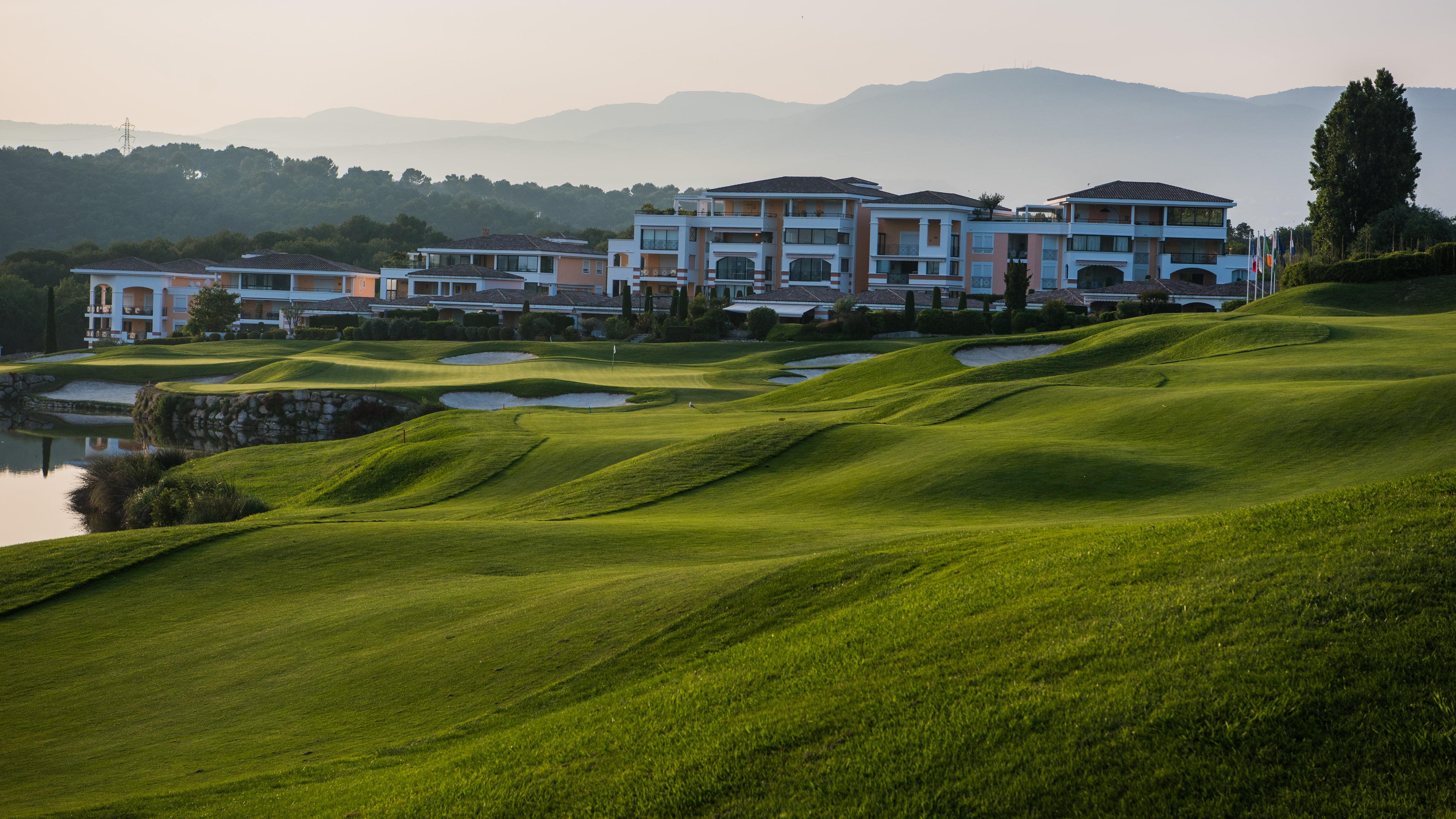 A well maintained fairway with rolling dunes