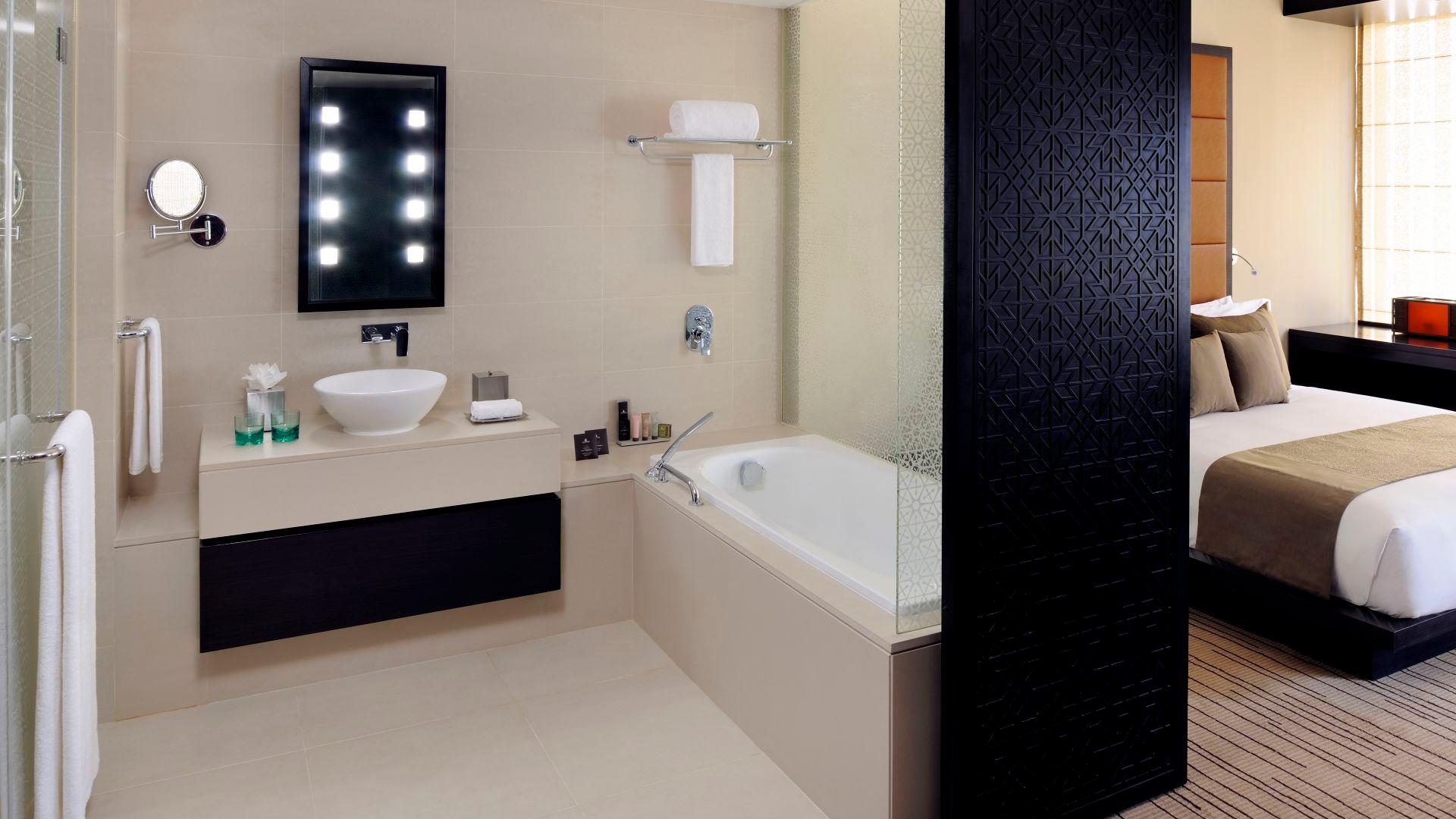 Bathroom as part of a double bed suite at Southern Sun - Abu Dhabi