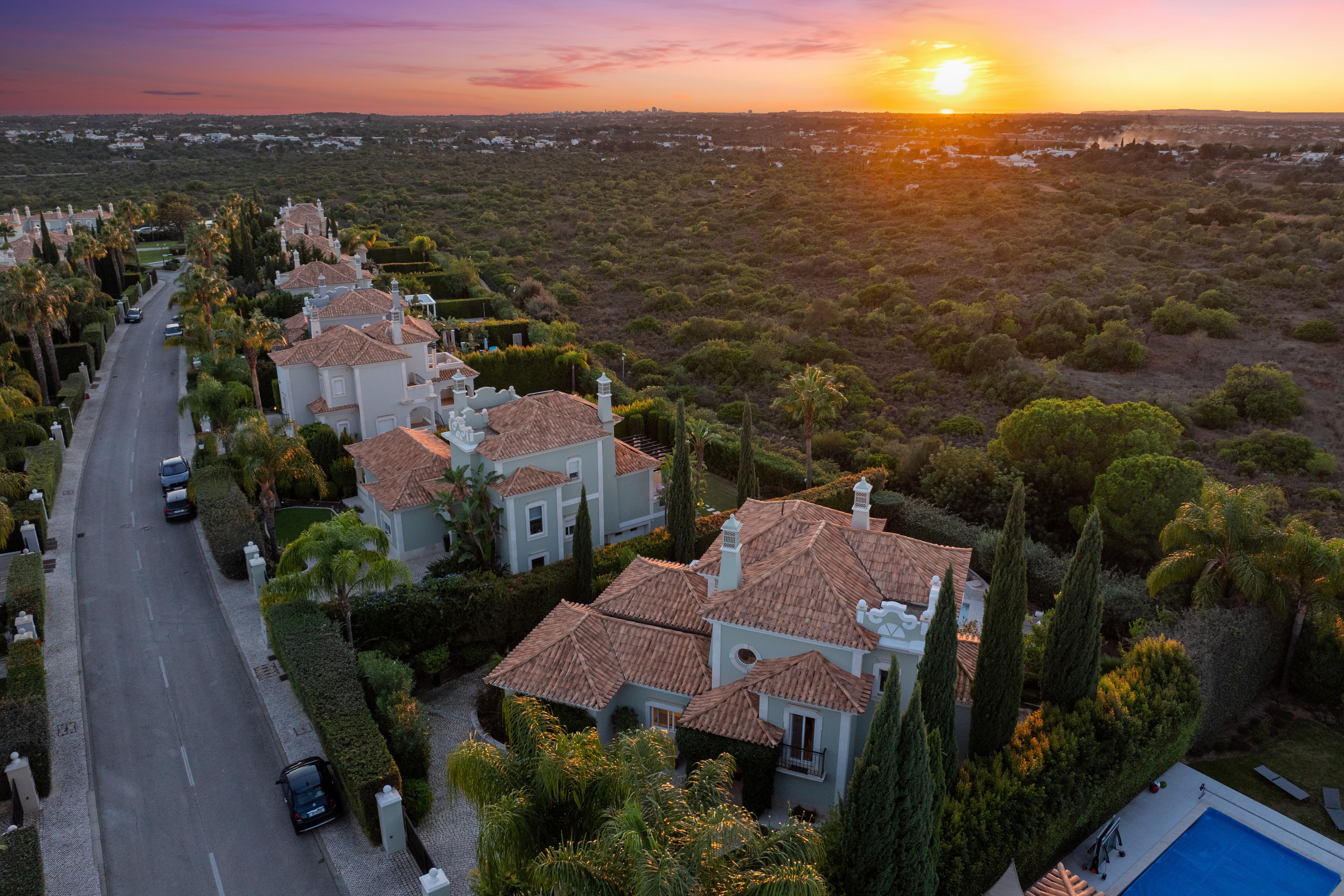 Sun setting over the villas at The Crest