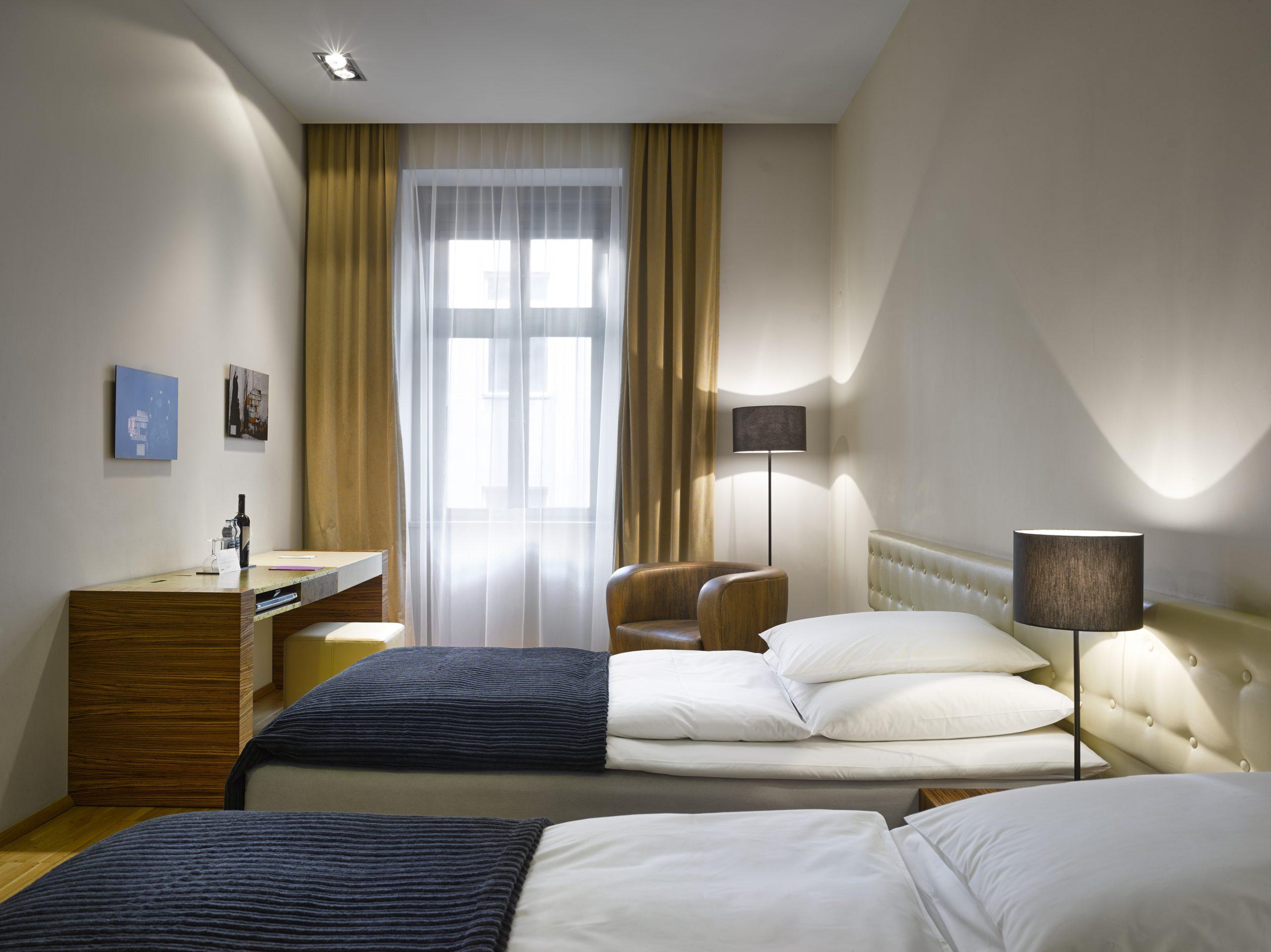Twin bed suite at The Icon Hotel